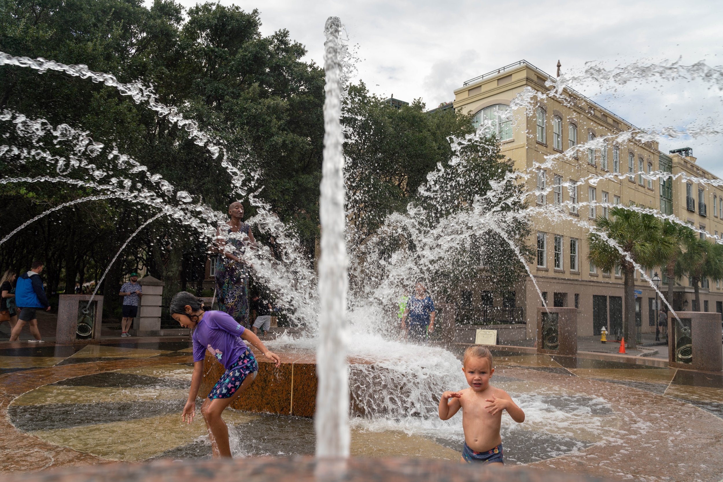 Children Play in Fountain