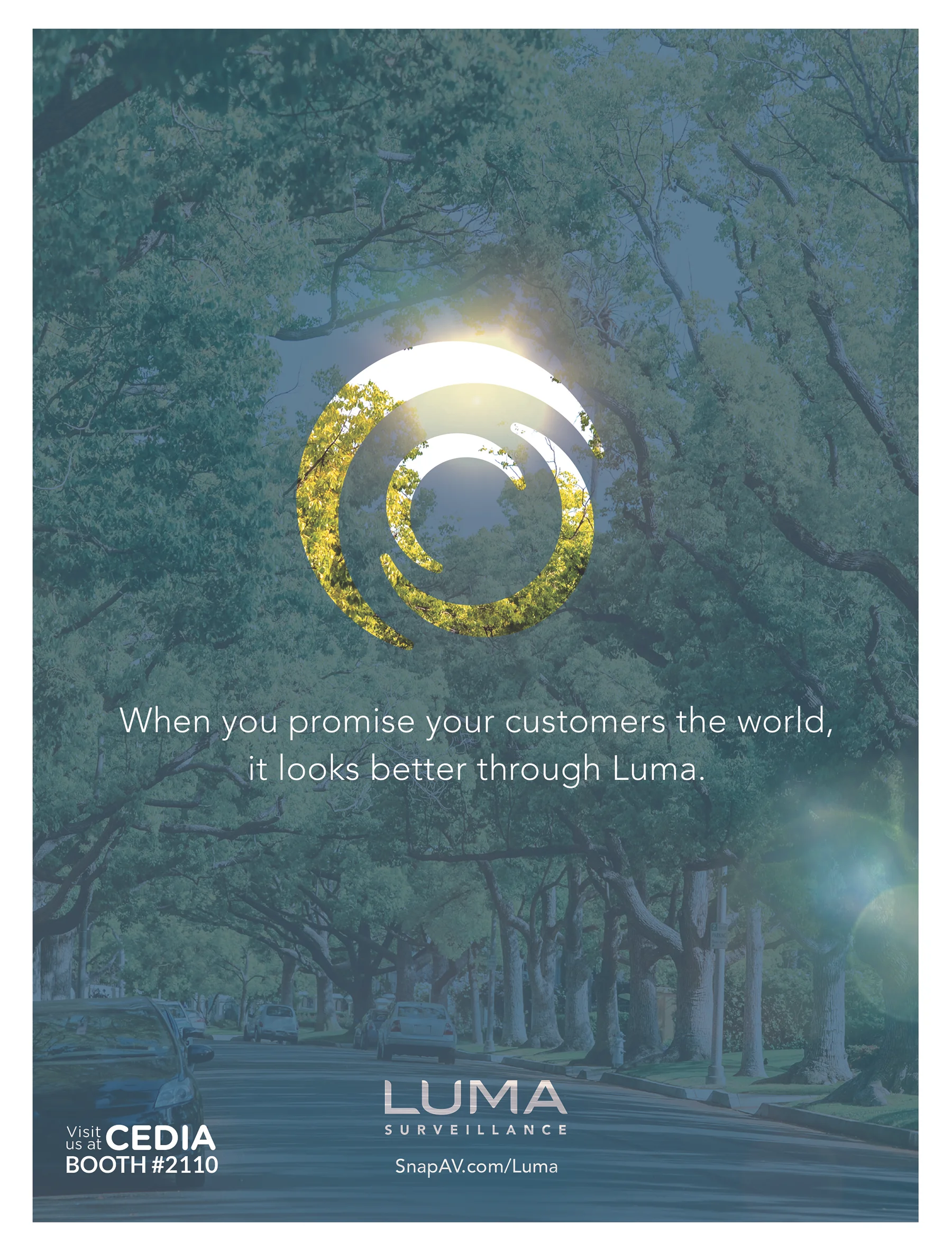 Round green logo silhouetted over a quiet tree-lined street. Ad reads: "When you promise your customers the world, it looks better through Luma.""
