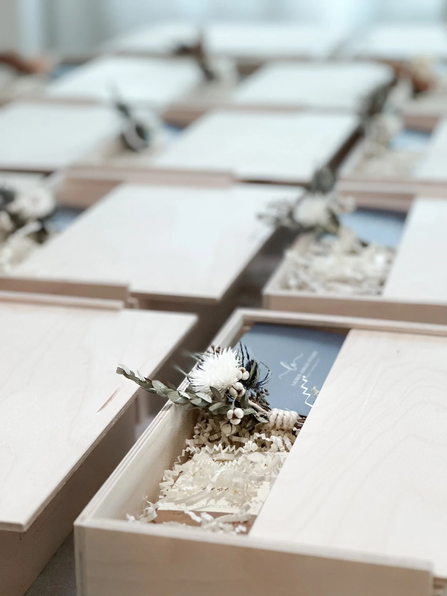 Luxury handcrafted wooden gift boxes with curated contents for corporate gifting