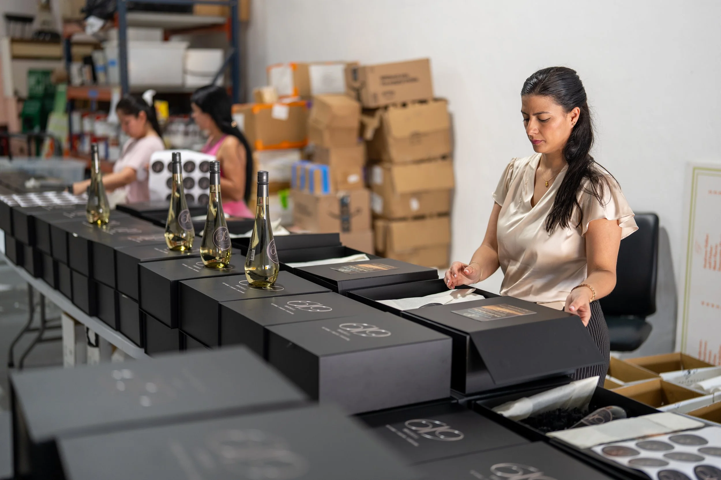 Corporate gift box assembly workspace in Miami for a large branded project