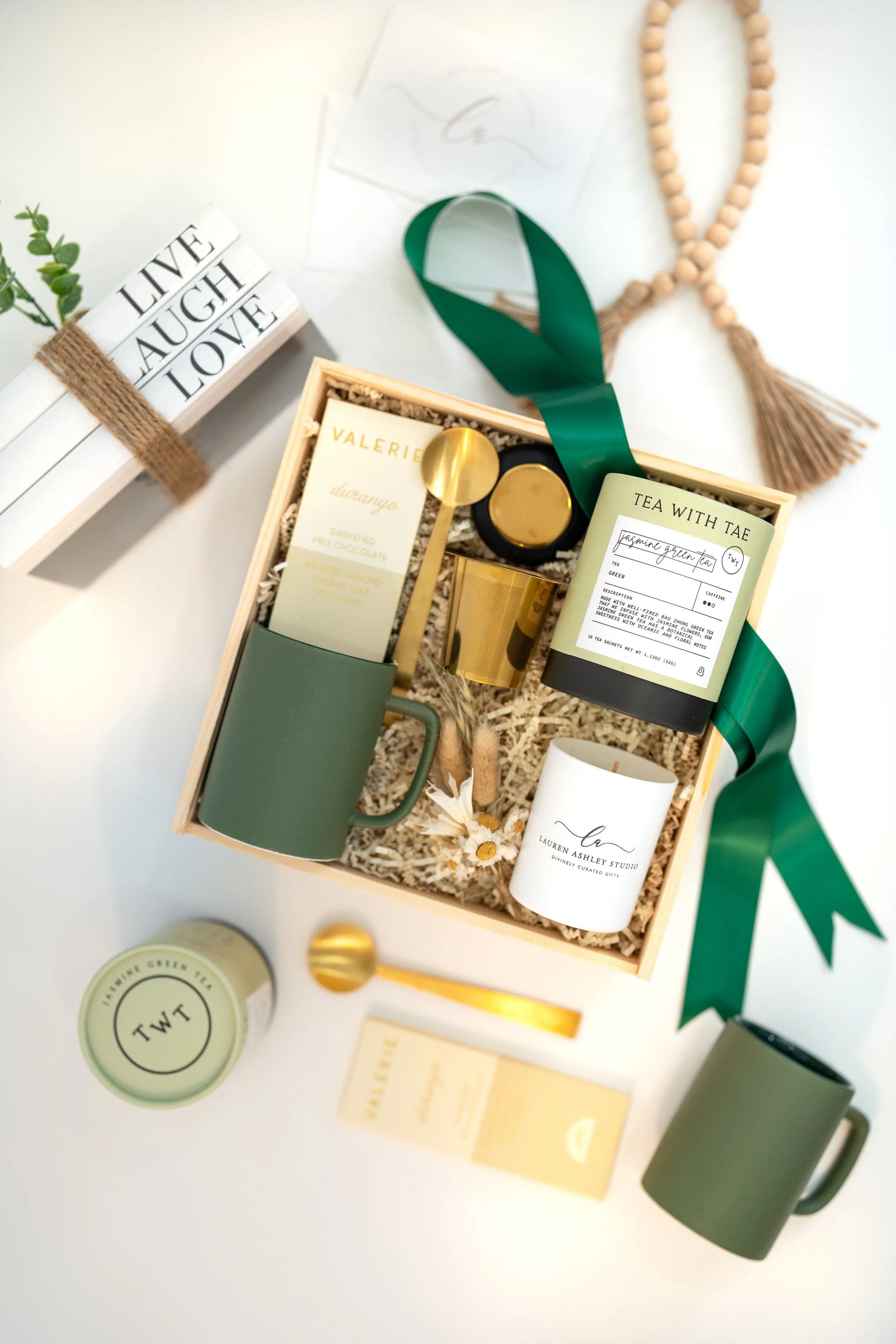 Flat lay of a custom corporate holiday gift box with premium items