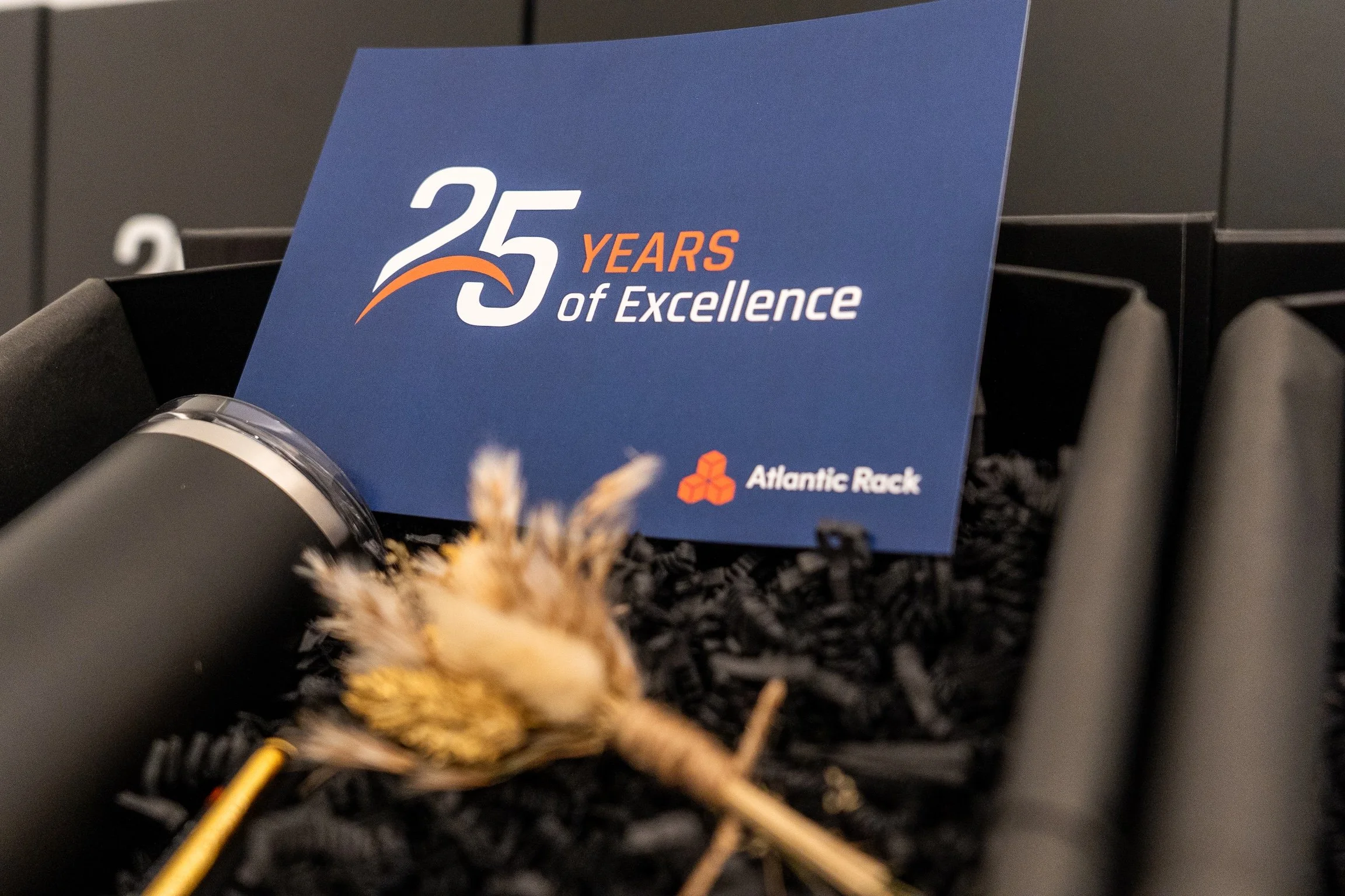 Custom corporate gift boxes in Miami celebrating Atlantic Rack’s 25 year company milestone