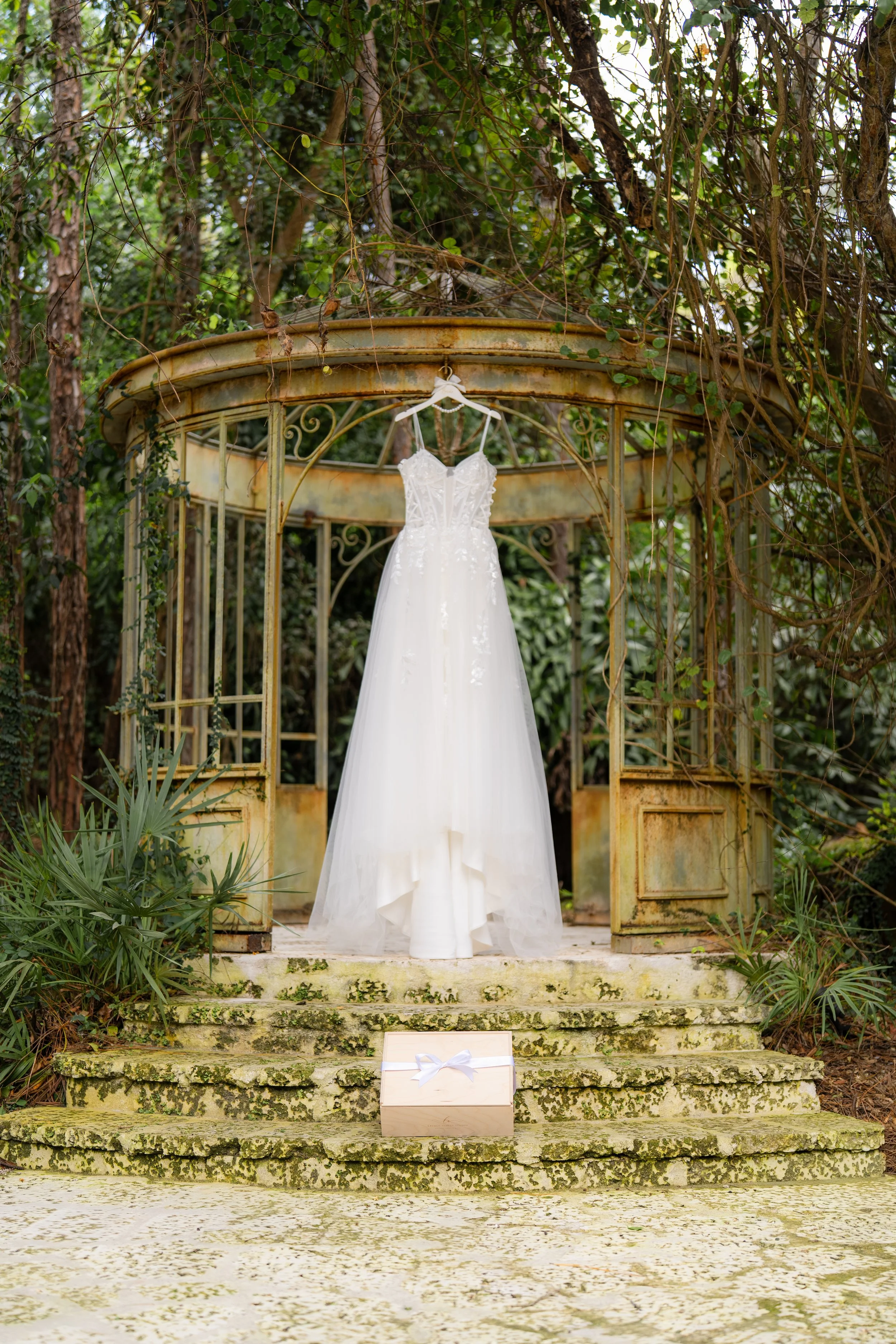 Luxury bride gift box in Miami styled with wedding dress before ceremony