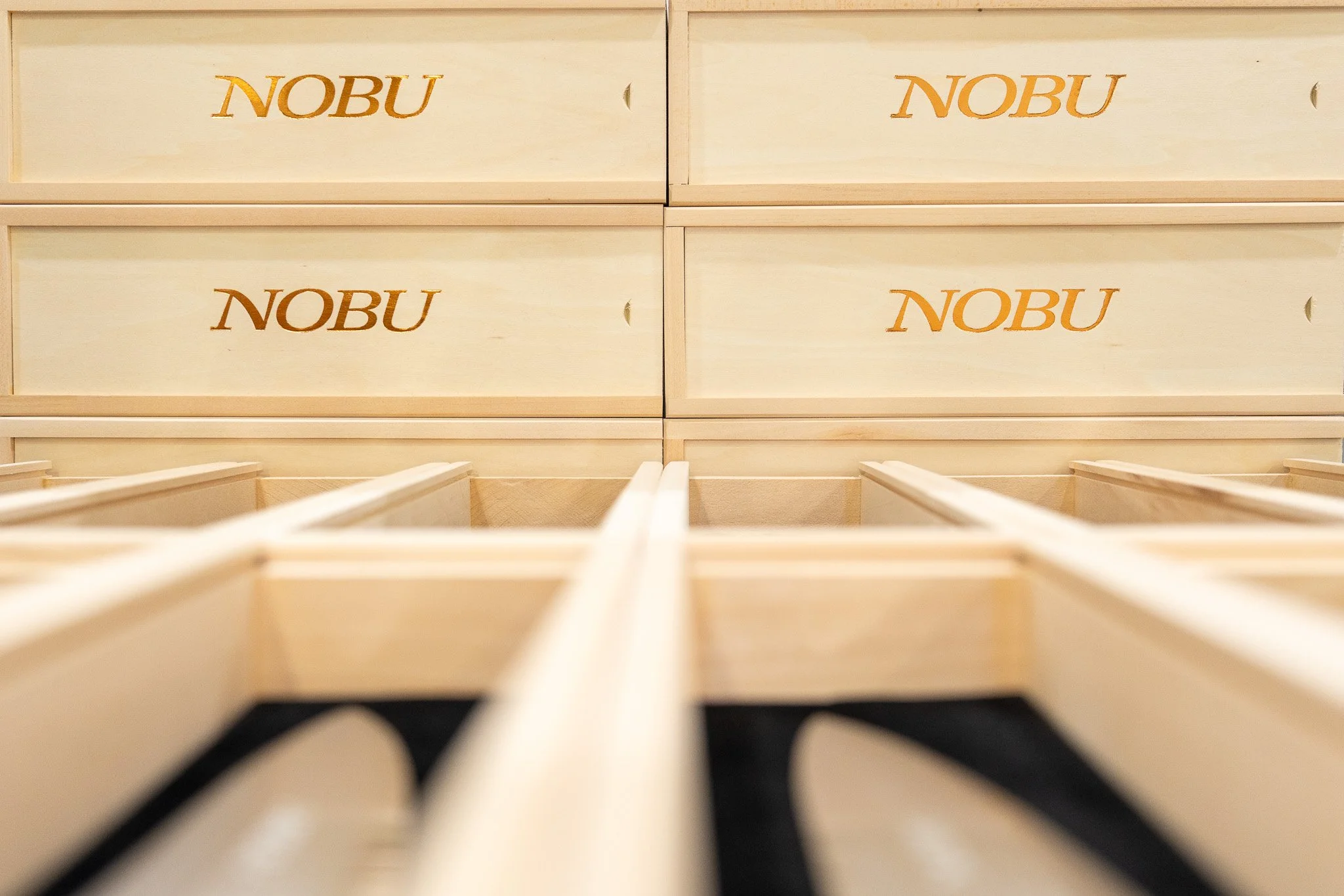 Large branded gift box order in Miami with multiple custom wooden Nobu boxes