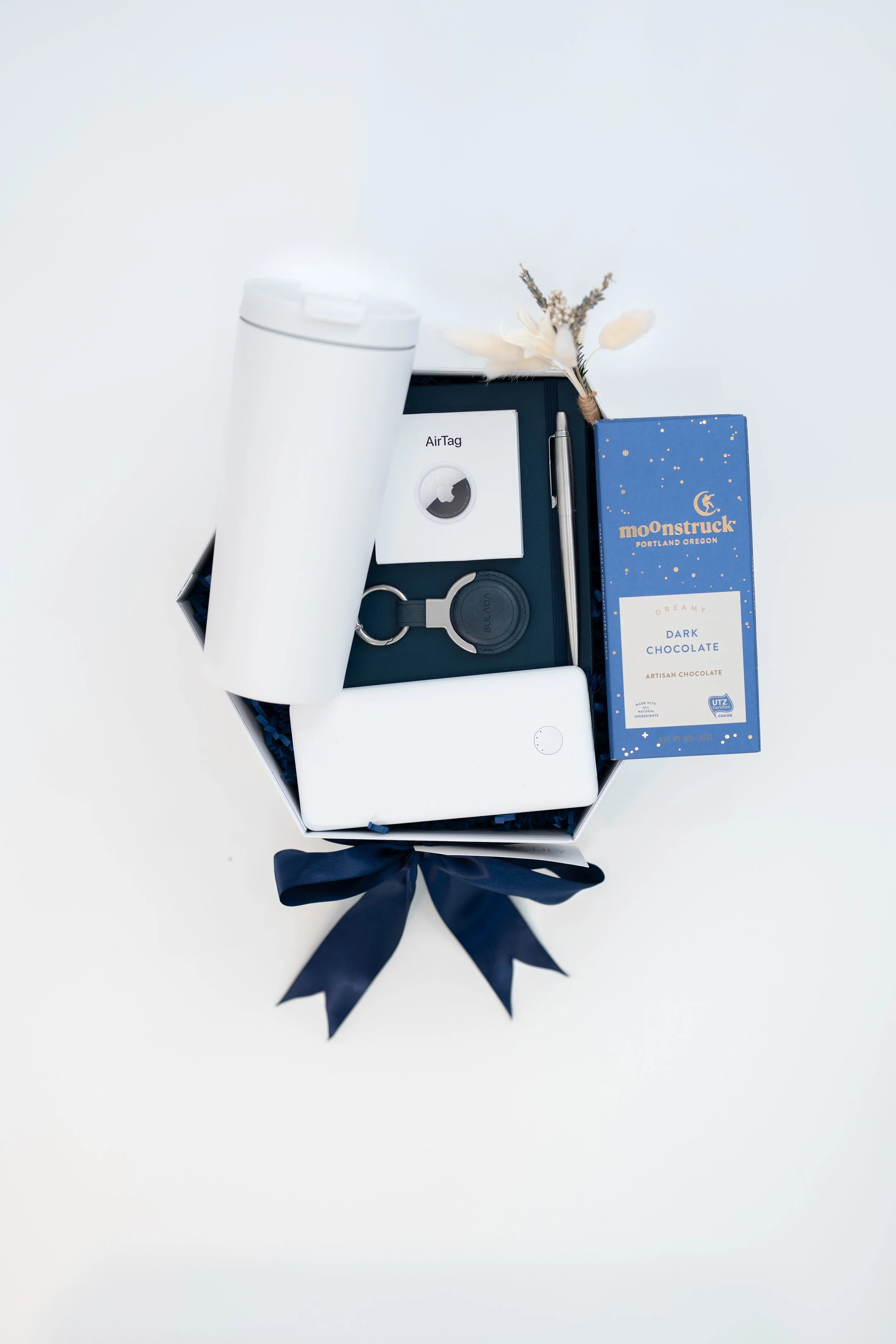 Open tech conference gift box with premium items in Miami