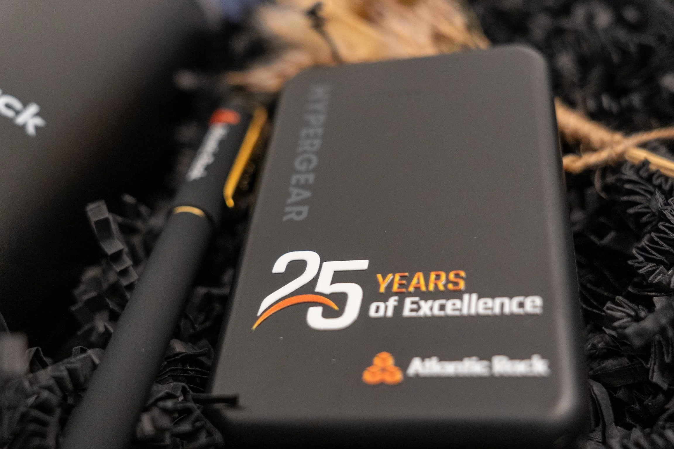 Company anniversary gifts for employees and clients featuring Atlantic Rack branded accessories