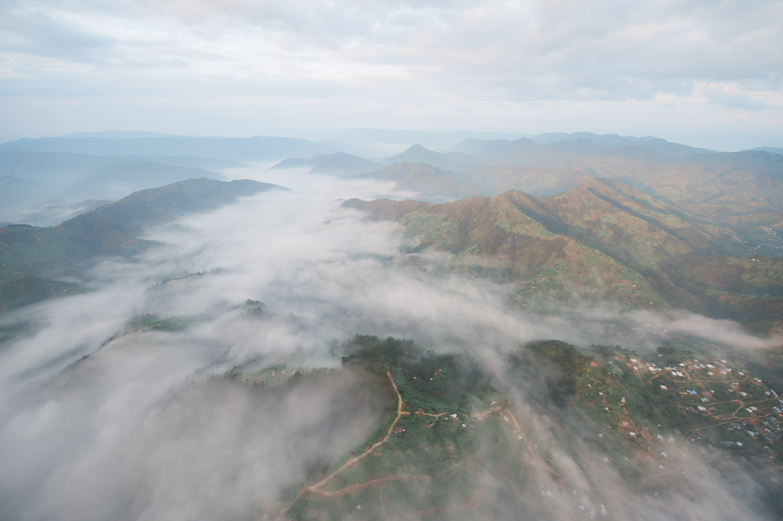  Low clouds roll through the hills of central Rwanda. 