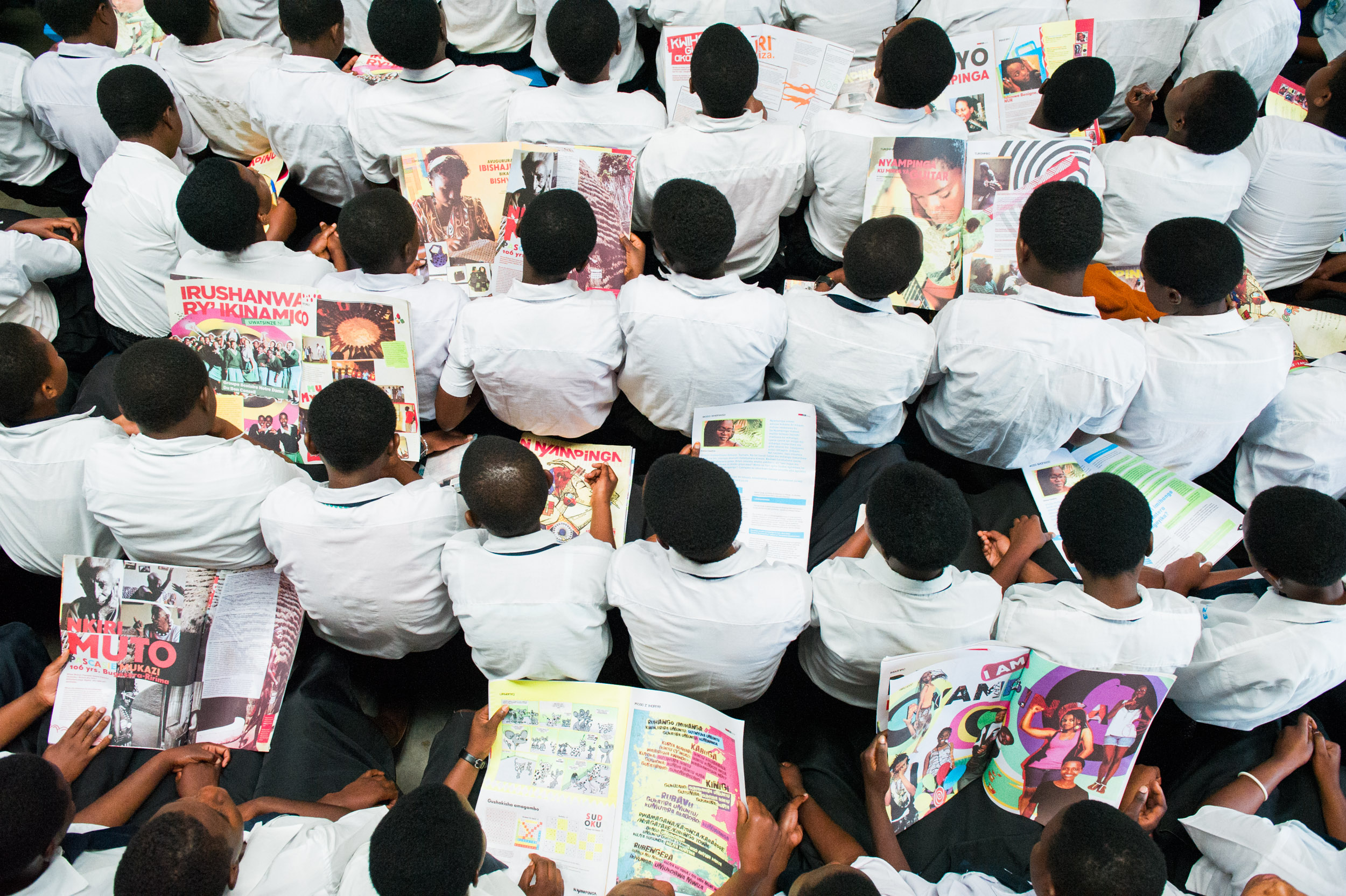  Girls read copies of Nike Foundation's new Ni Nyampinga magazine in a school in northwestern Rwanda. 