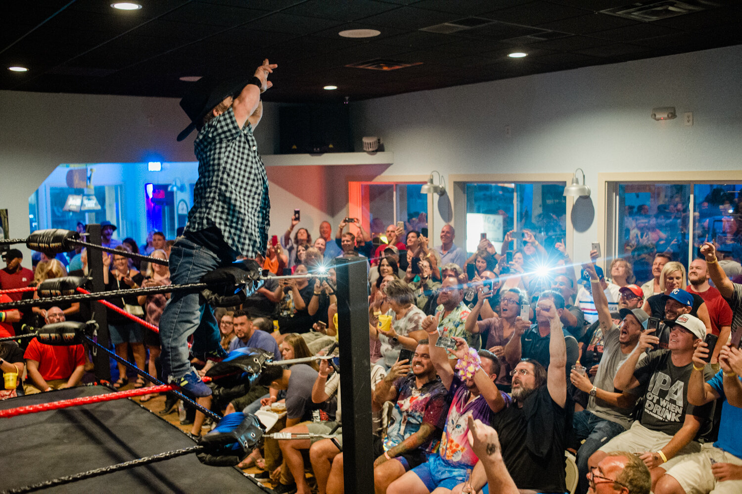  More than 300 people pack Surf City’s largest bar, Tortuga’s Nest, for a wrestling roadshow nicknamed the “Baddest Lil Show on Earth.”  (See the photo essay   here  .)  