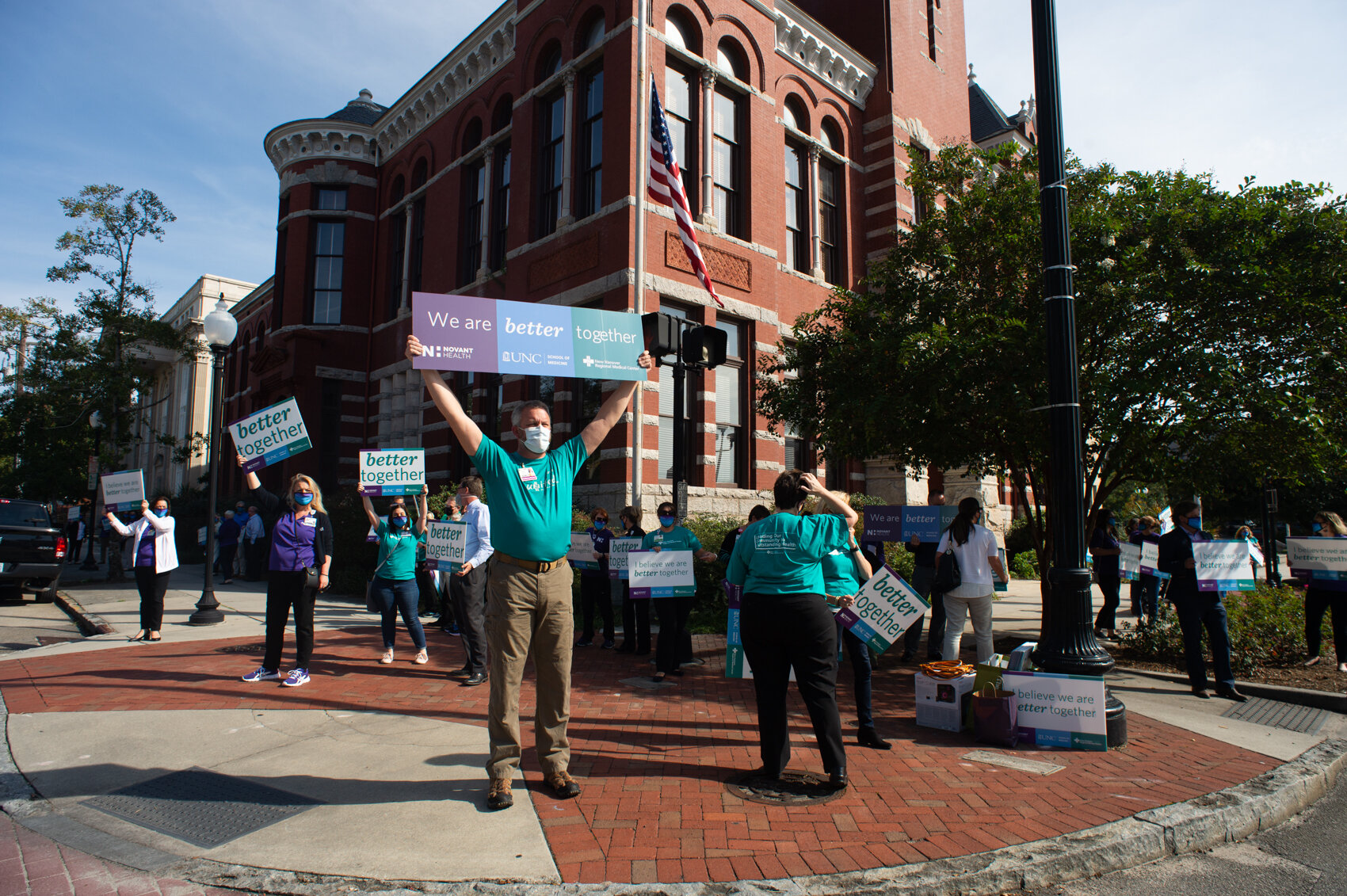  Supporters of the sale of New Hanover Regional Medical Center outside the county courthouse in Wilmington before county commissioners voted in approval of the $1.9-billion sale. (Read the story   here  .) 