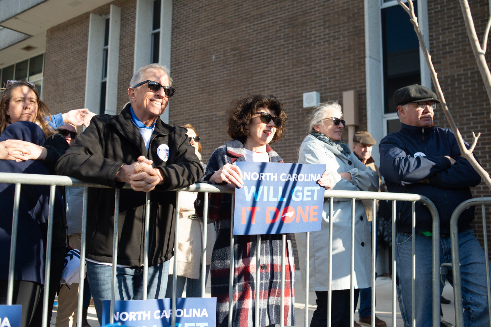  Alan and Maureen Abbate watch as Democratic presidential candidate Michael Bloomberg speaks to the crowd, Feb. 29, 2020. (Read the story   here  .) 