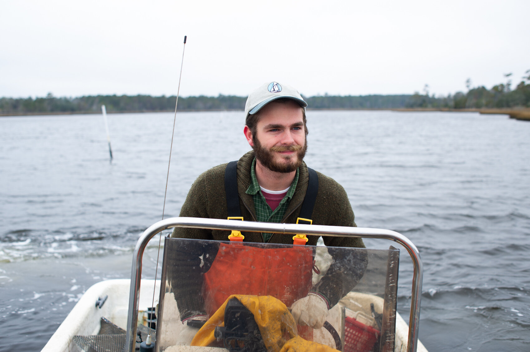  Evan Gadow drives his boat out to a 17-acre lease next to Permuda Island to prepare for the next day's oyster harvest. (Read the story   here  .) 