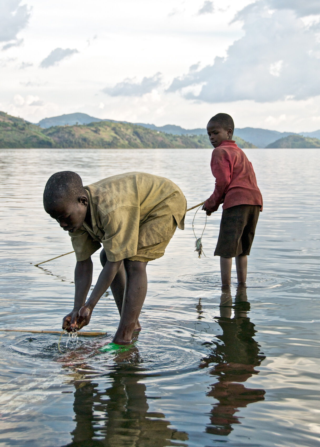 Boys Fishing on Burera