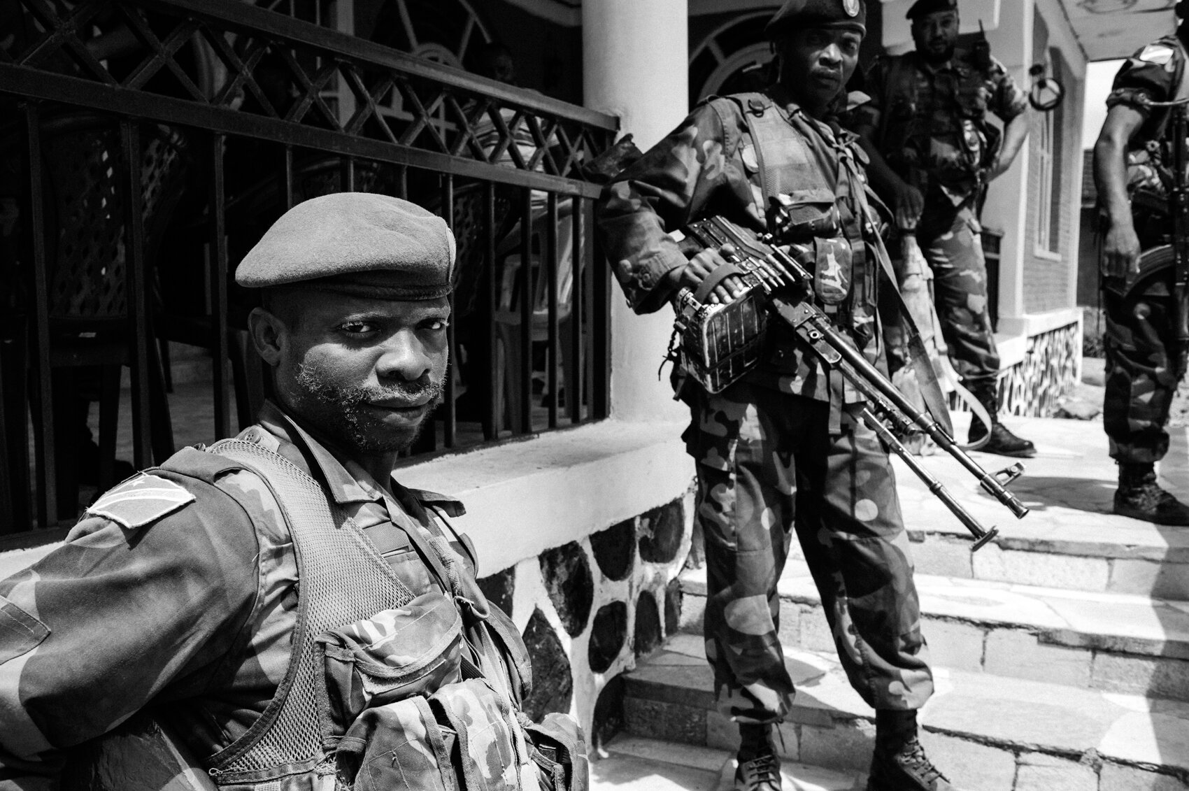  Soldiers of the Armed Forces of the Democratic Republic of the Congo near a house on the shores of Lake Kivu used as a command post for the treated army. 