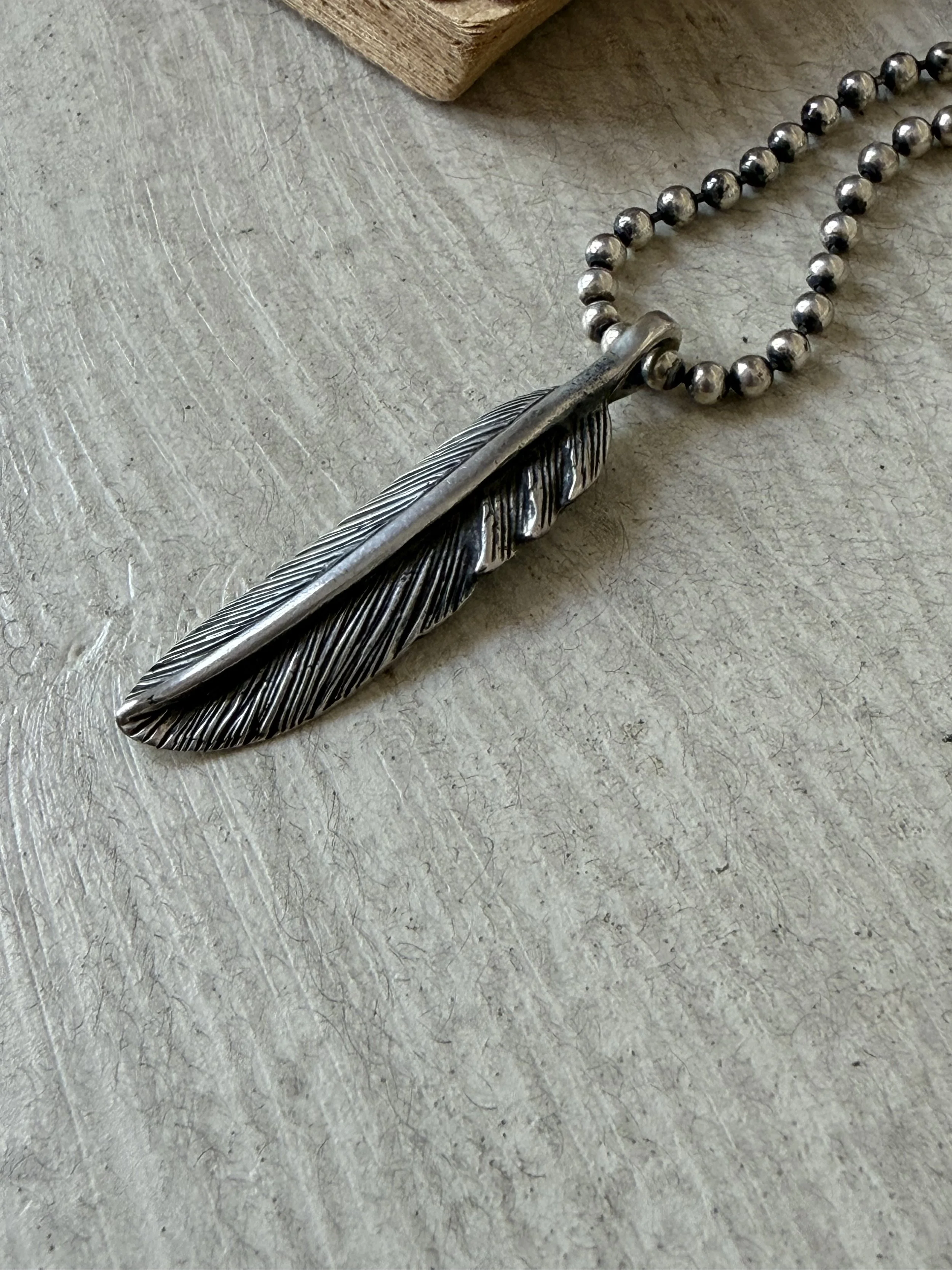 The Falcon Feather Pendant