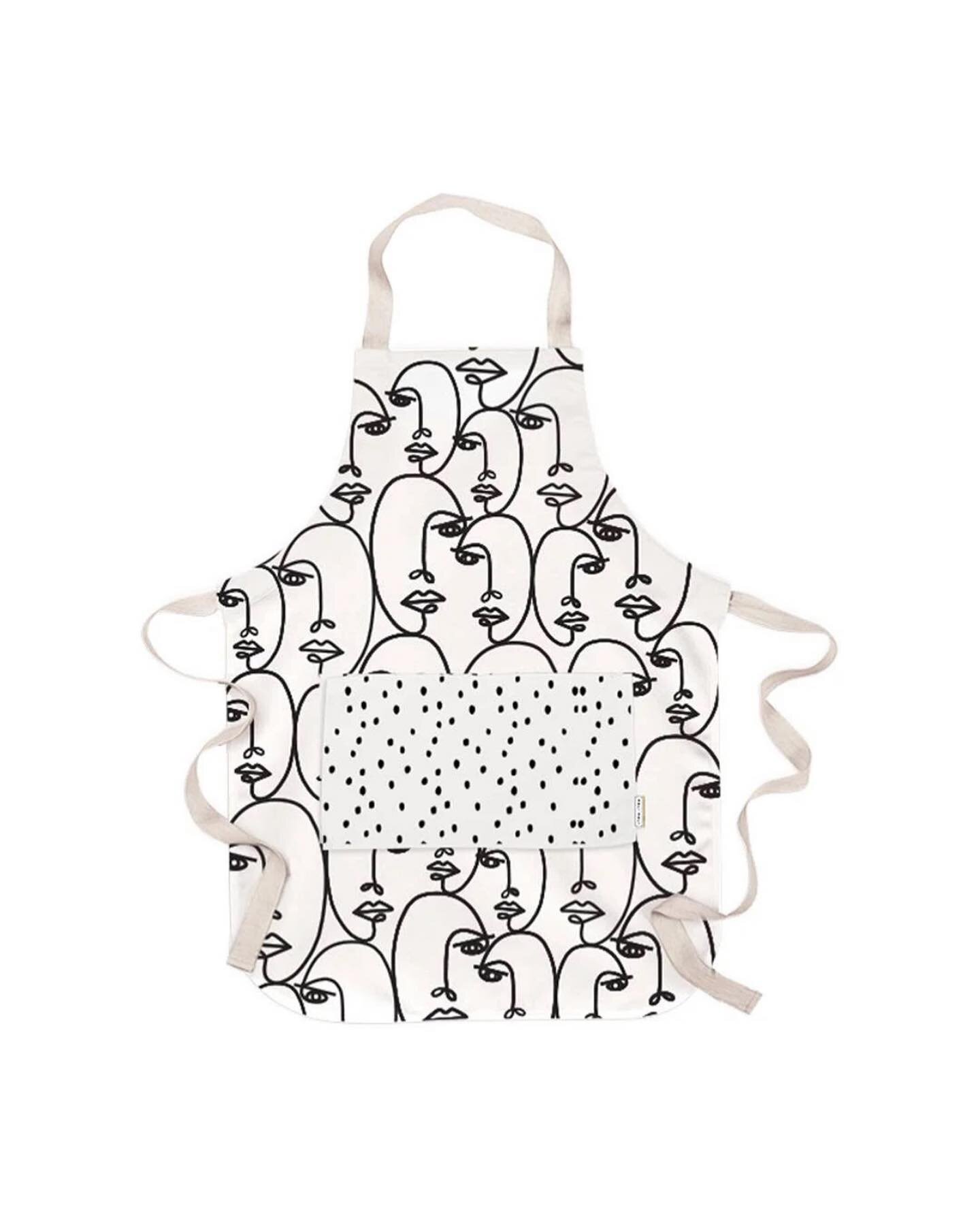 Face to Face Apron by Hali Hali

Protect clothes from spills and splatters with this cotton apron adorned with playfully chic faces. Spacious polka dot front pocket can hold all kinds of kitchen tools and gadgets (and, most importantly, your phone) w