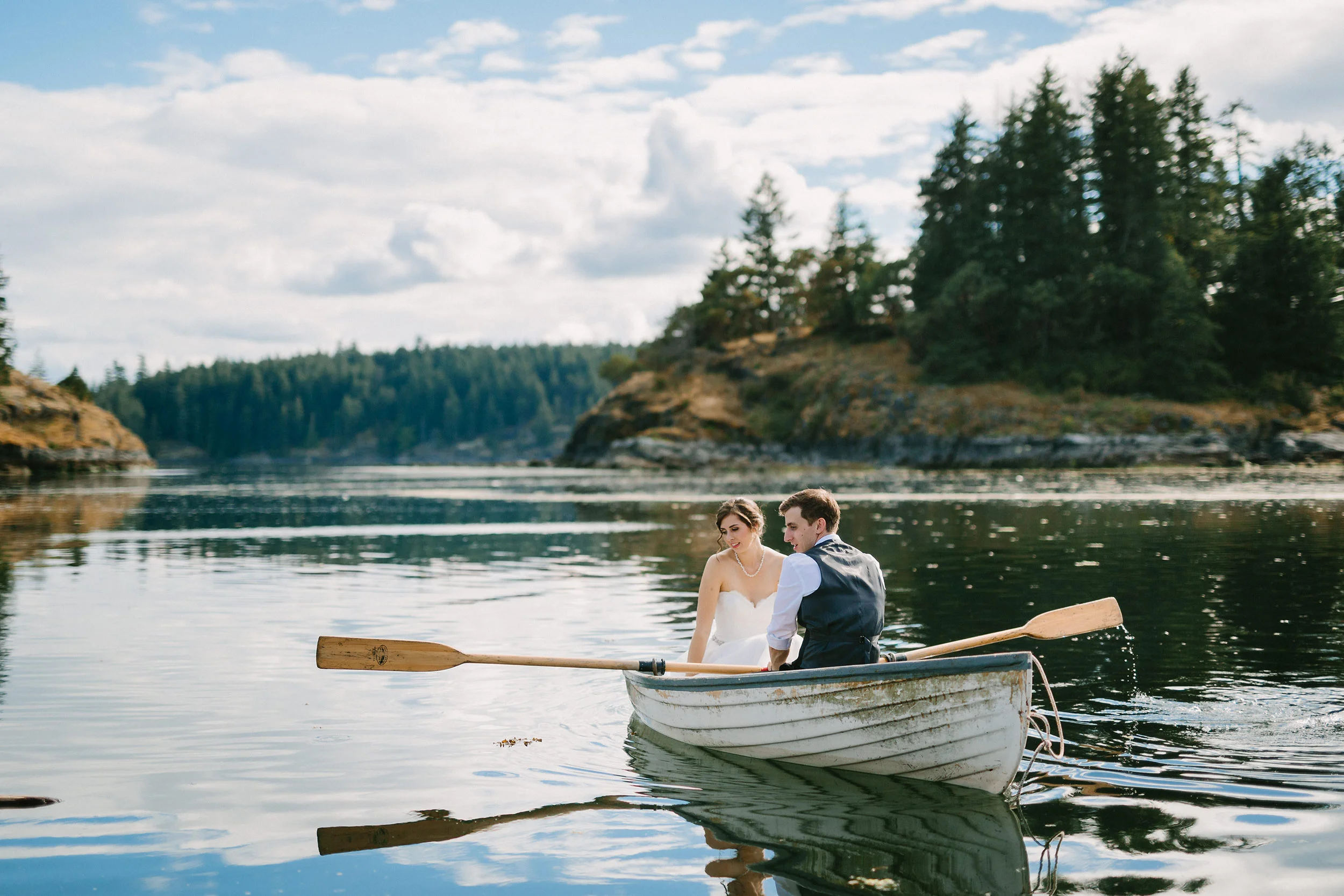 wedding photography Victoria BC Canada couple in boat rows