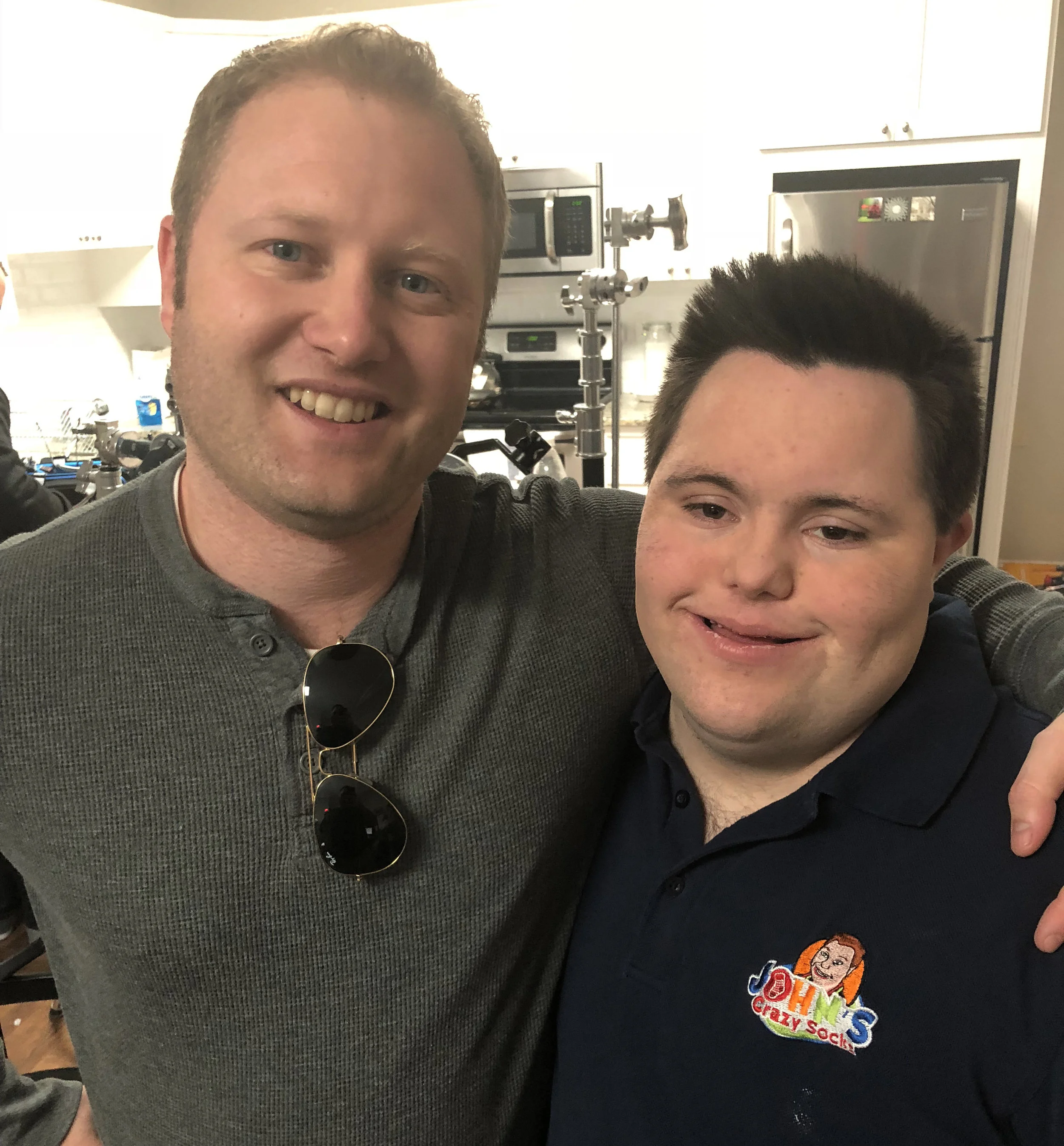 One of our producers Derek with John of John's Crazy Socks