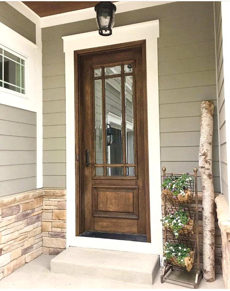 Side porch of a modern farmhouse painted with Cabot Solid Stain in Pewter Gray - Farmhouse Redefined