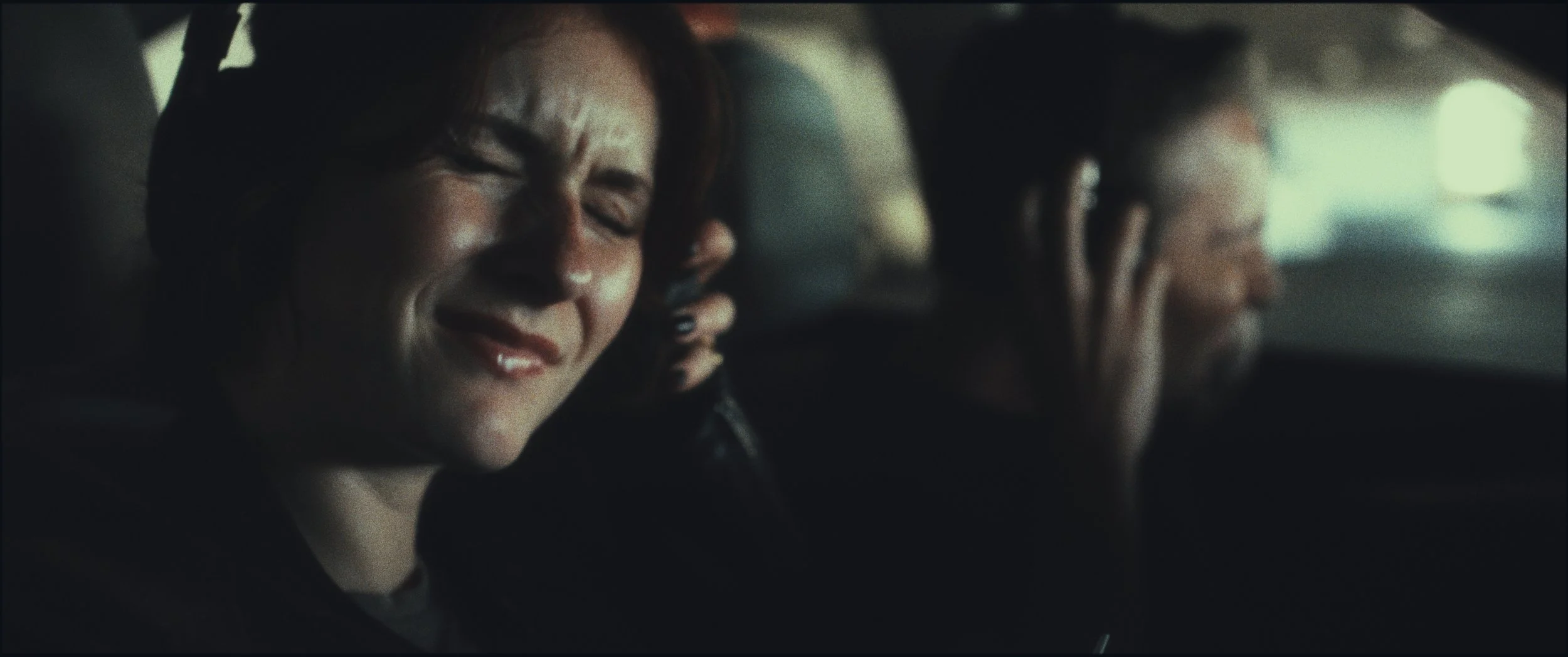Close-up of a woman wincing inside a car, Five Finger Stakeout, Omaha 48 Hour Film Challenge 2026