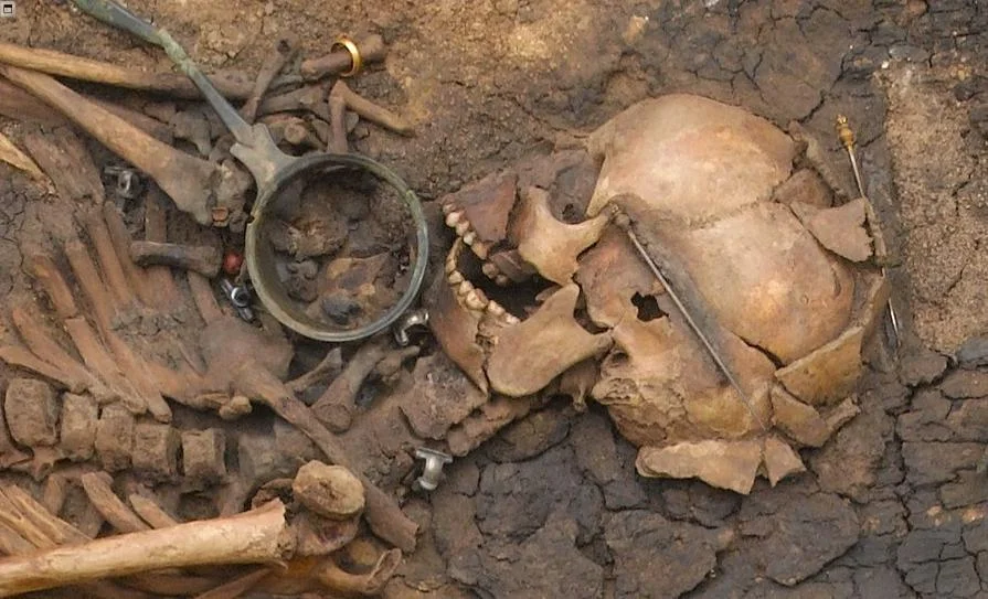 at juellinge in denmark, this roman era woman was laid to rest with roman drinking vessels and a strange concoction.