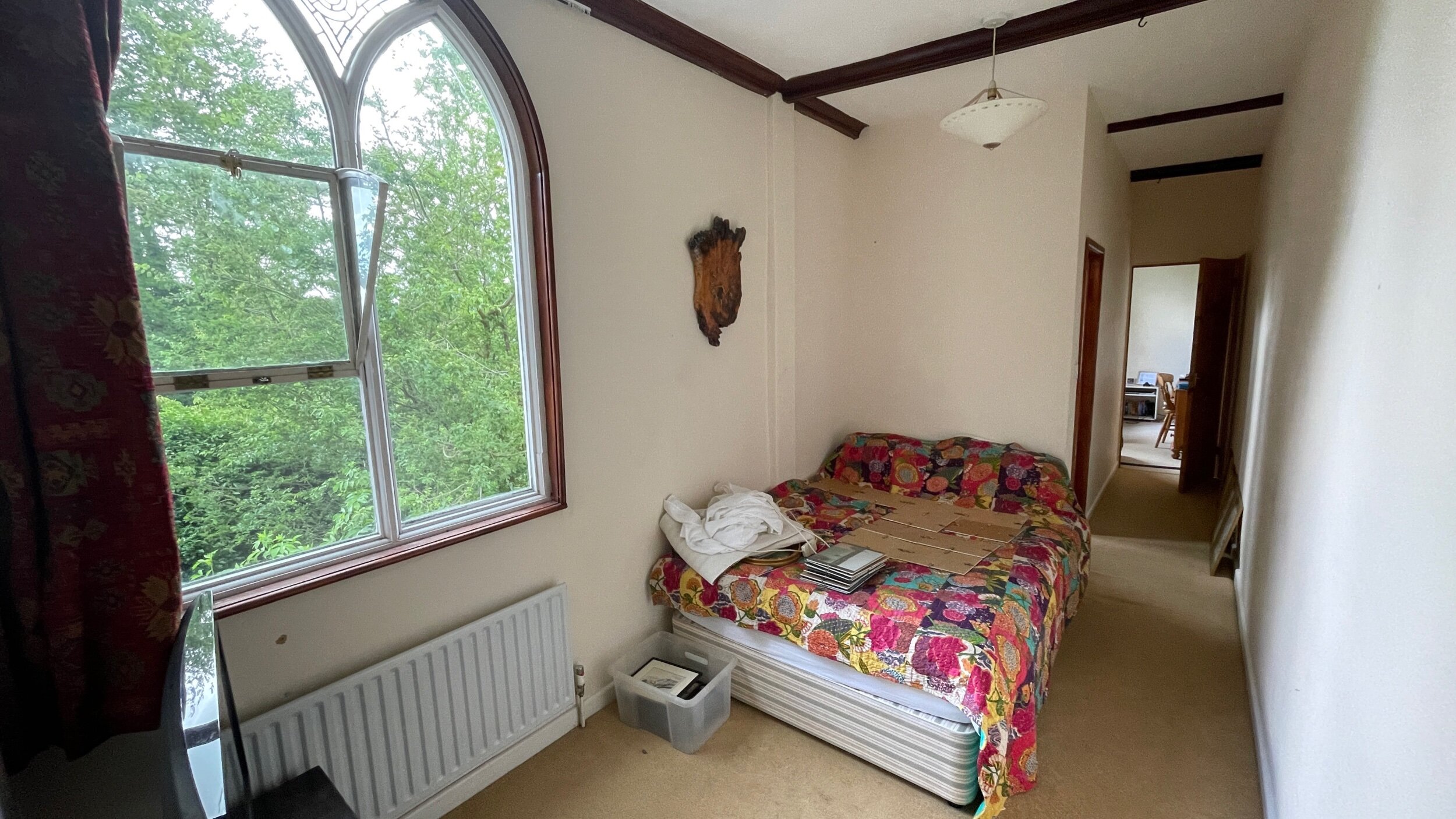 Guest room. Looks like a corridor, but isn’t. That’s an en-suite.