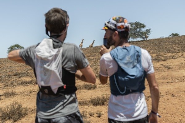 Copy of Copy of Copy of Paddy and Greg tkaing photo of giraffe while running .jpg