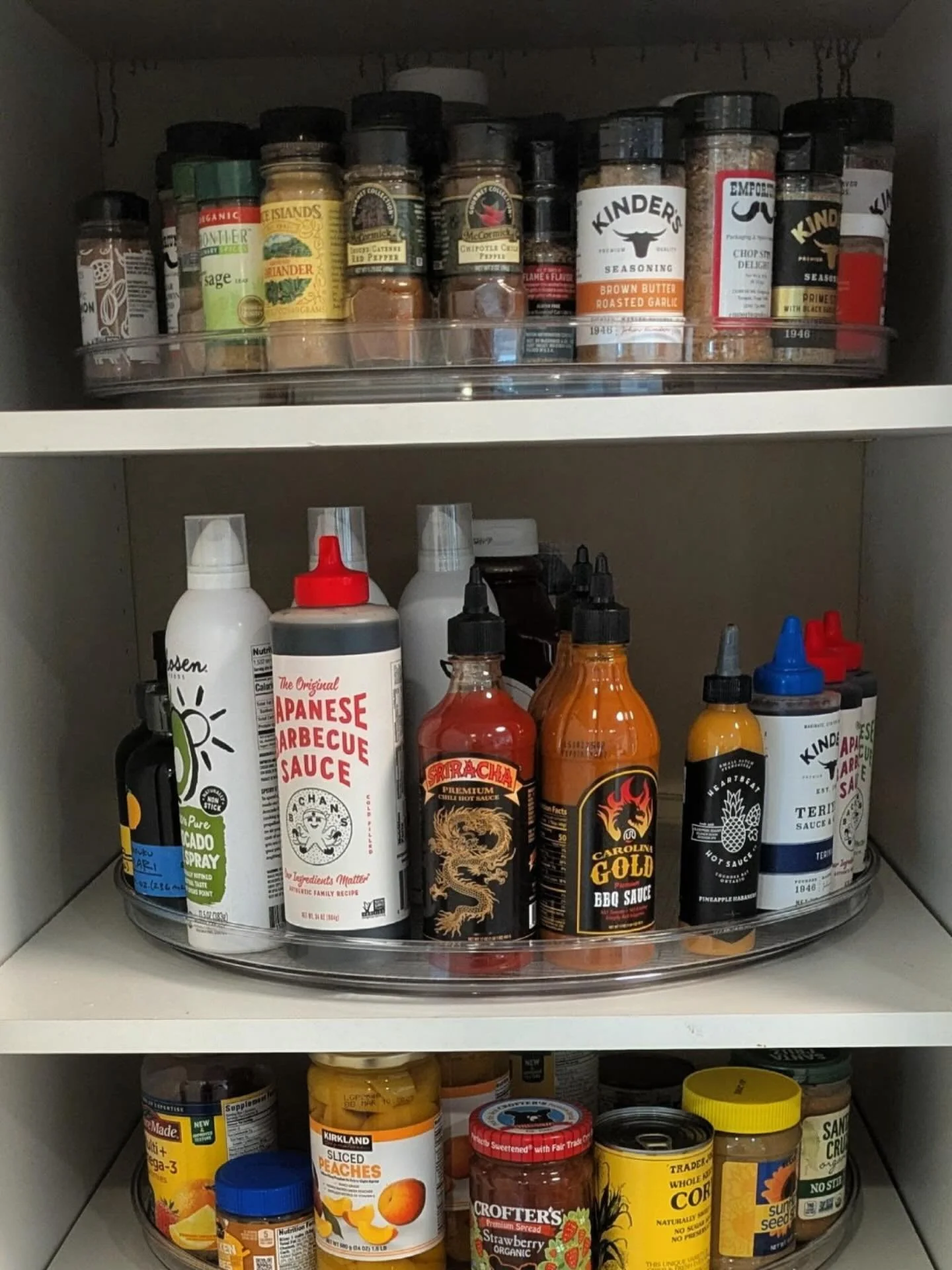 Sometimes you just need a giant Lazy Suzane. 
Not gonna show you the before picture because I forgot to take one but trust me when I say this cooking zone is so much more efficient and this deep cabinet is much better utilized.