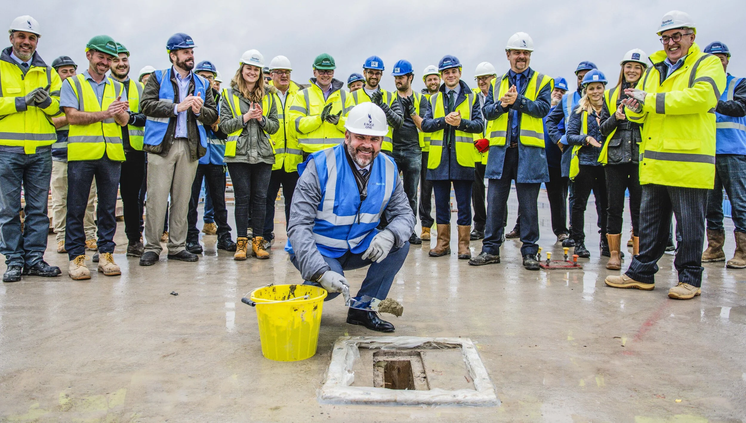 Pictured: Paul Goodes (Eagle One Managing Director) places the last section of concrete.