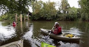 kayers on river.jpeg