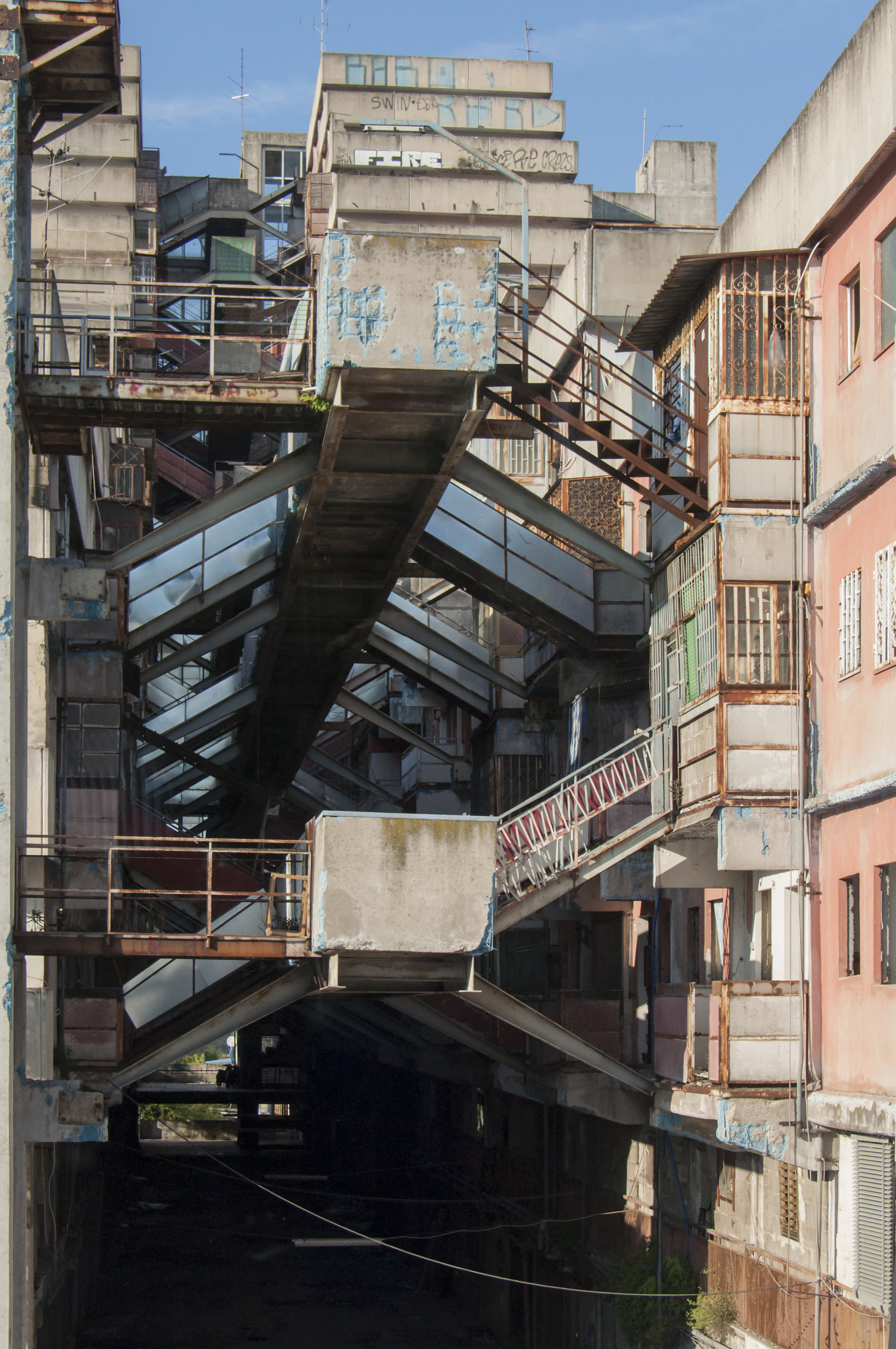 The intricate connecting stairs. Details of the Sails of Scampia in the Secondigliano district. Naples, Italy.