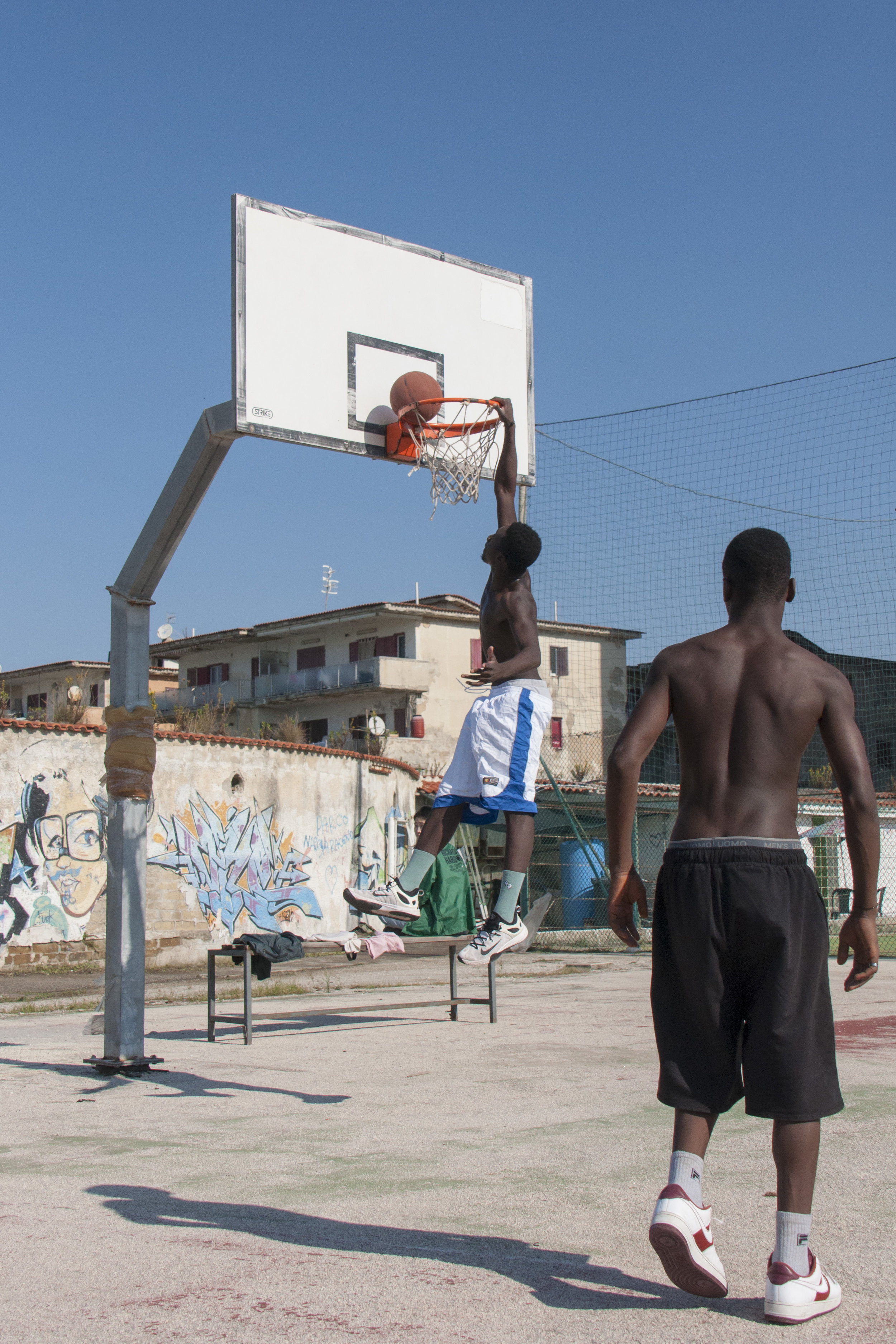 Practice makes perfect: James, a member of the Tam Tam Basket, making a dunk. Castel Volturno. Naples, Italy