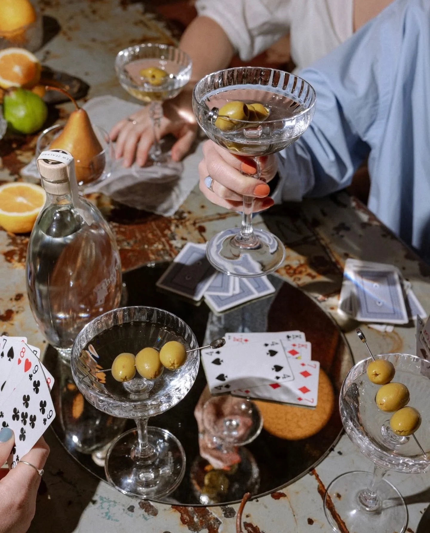 A winter weekend well spent: perfectly chilled @thereidvodka martinis, a deck of cards, good company, and nowhere else to be. 🍸🃏❄️