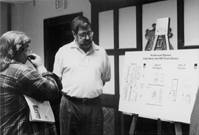 Aaron Isaacs of Metro Transit discusses the Project alternatives with an area resident.