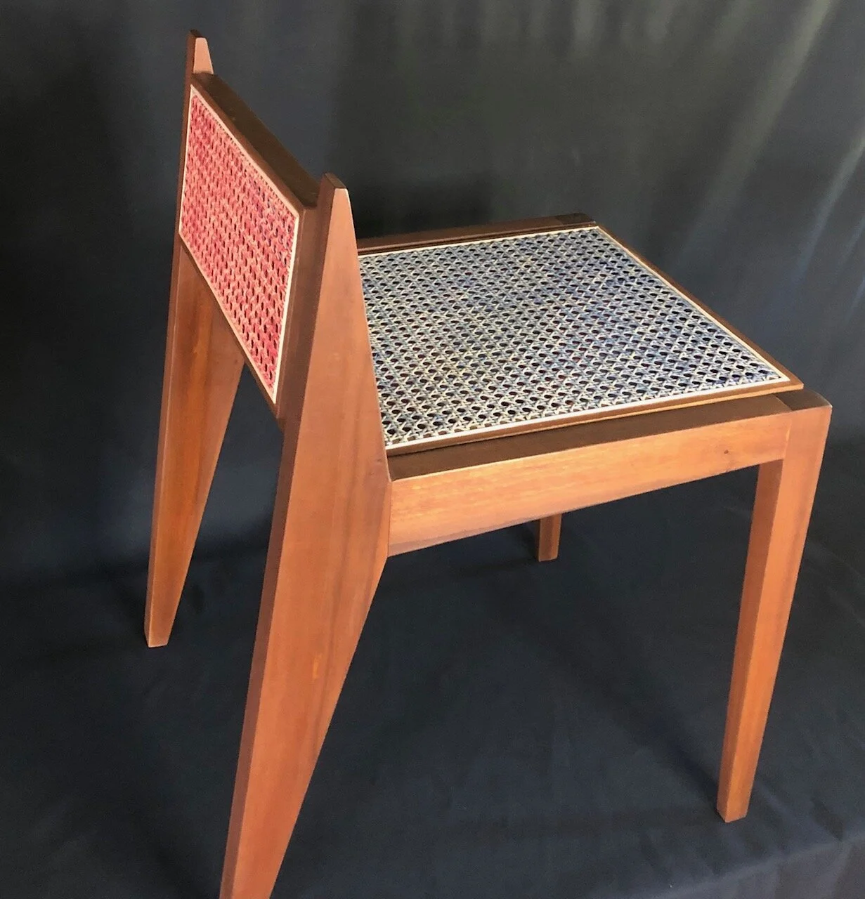 Jessie-Temple-pressed-cane-chair-red-blue-1.jpg