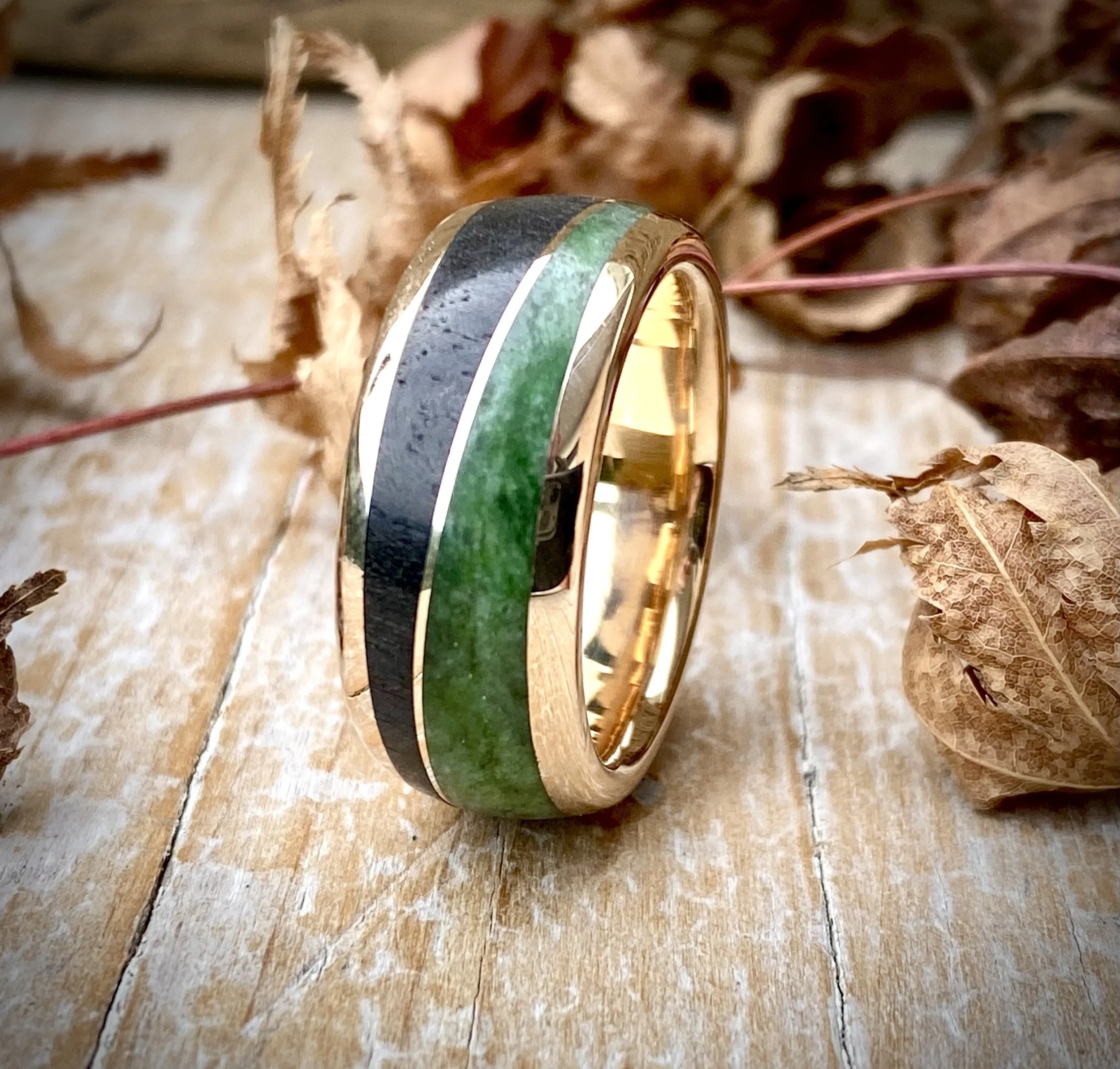 A stunning Pounamu & Ebony wedding band