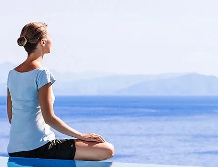 WomanMeditatingOutdoors_0.jpg