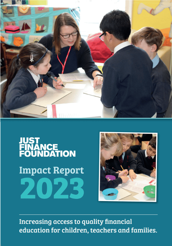 Cover page of a report titled 'JUST FINANCE FOUNDATION Impact Report 2023' showing children and a teacher working together at a table in a classroom