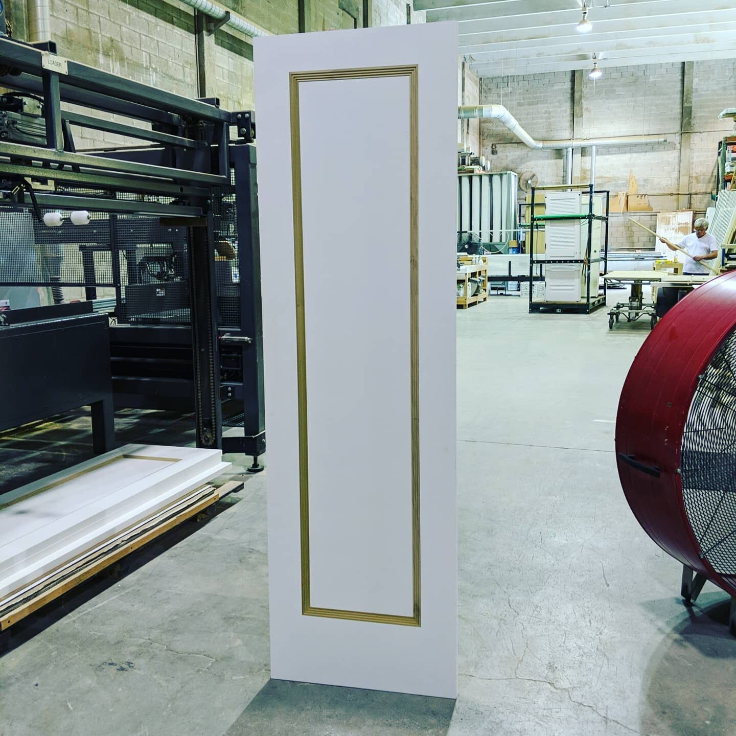 By customer request. Our customer was looking for something a little different and we think it looks great! This is pattern 300 trim molding applied to a shaker one panel. Come see what we can make for you. #architecturaldoors #shakerdoor