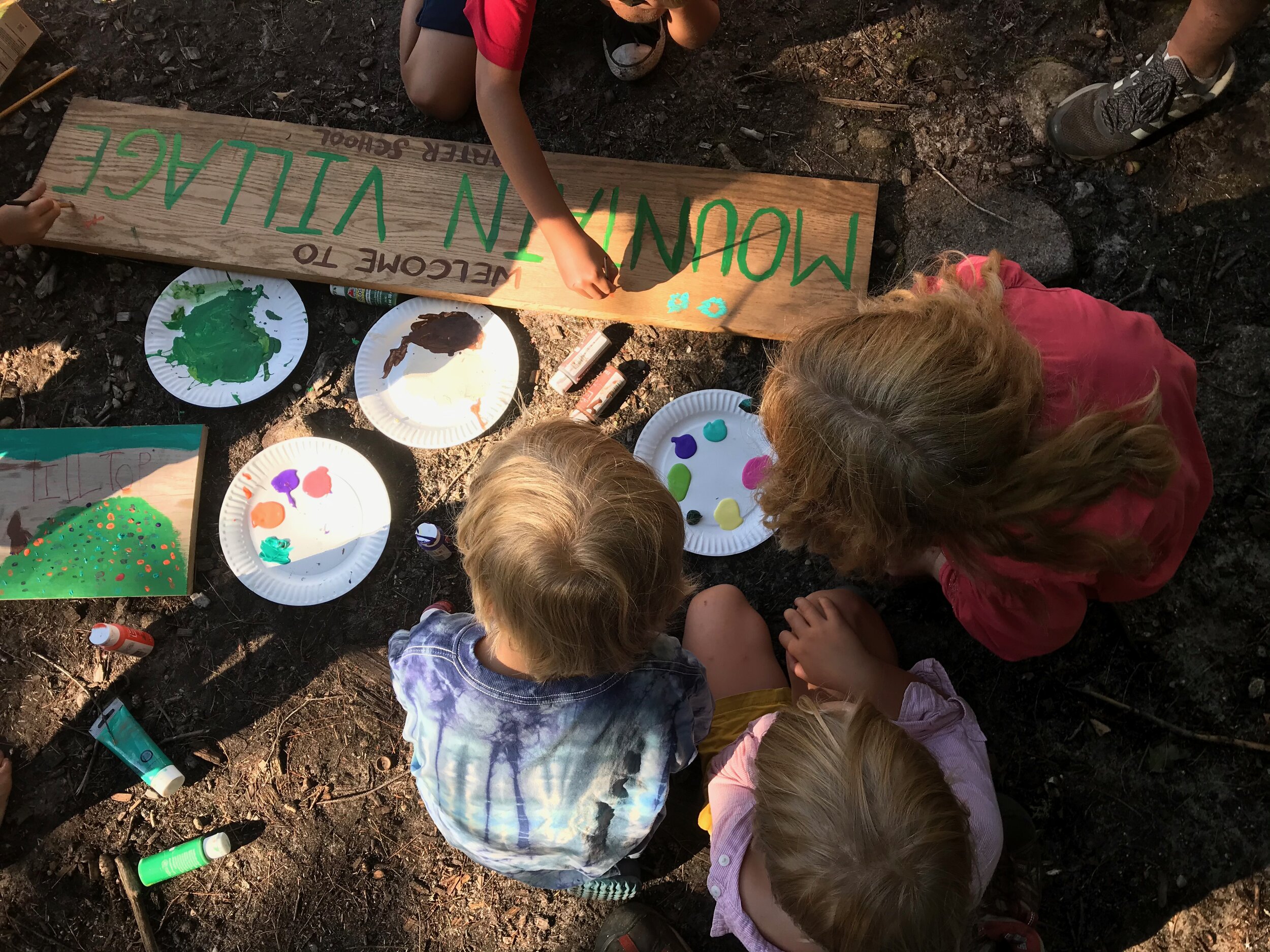 Kid volunteers making signs!