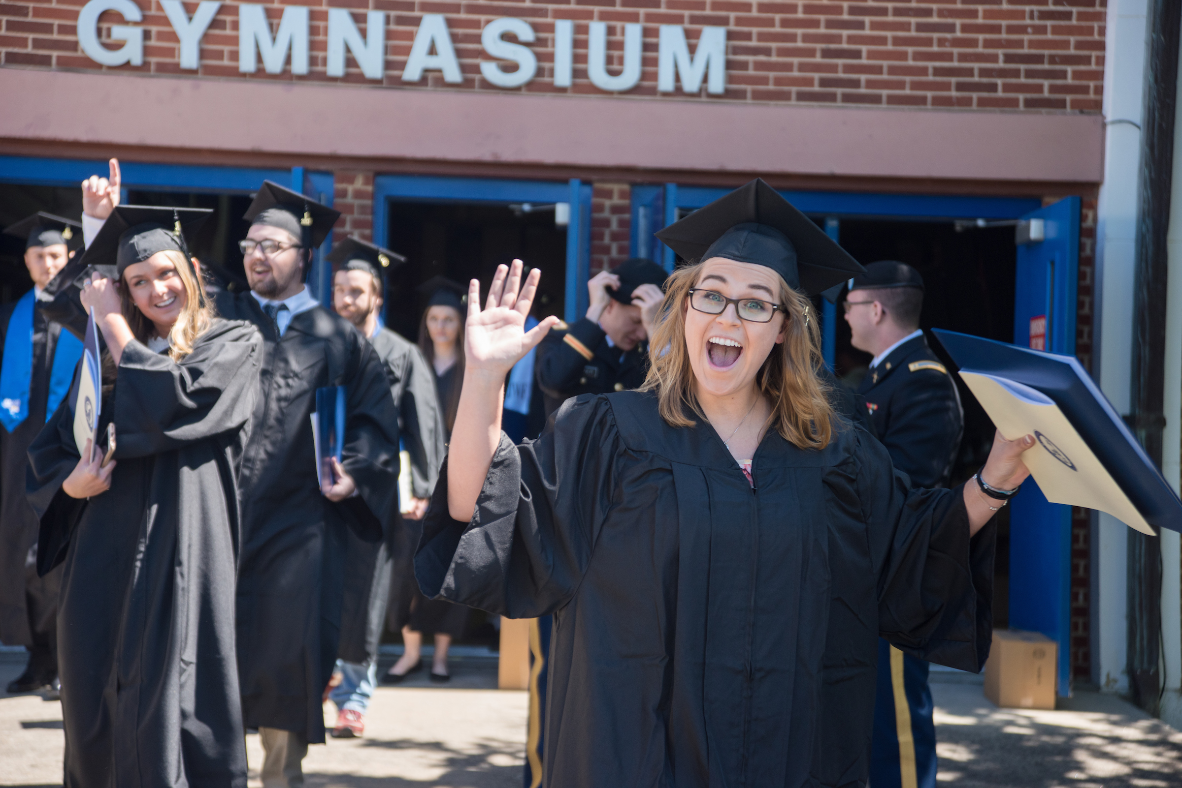 University of North Georgia graduate celebrates after graduating.