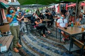 Miami rolls back restaurant dining as U.S. coronavirus deaths top 130,000