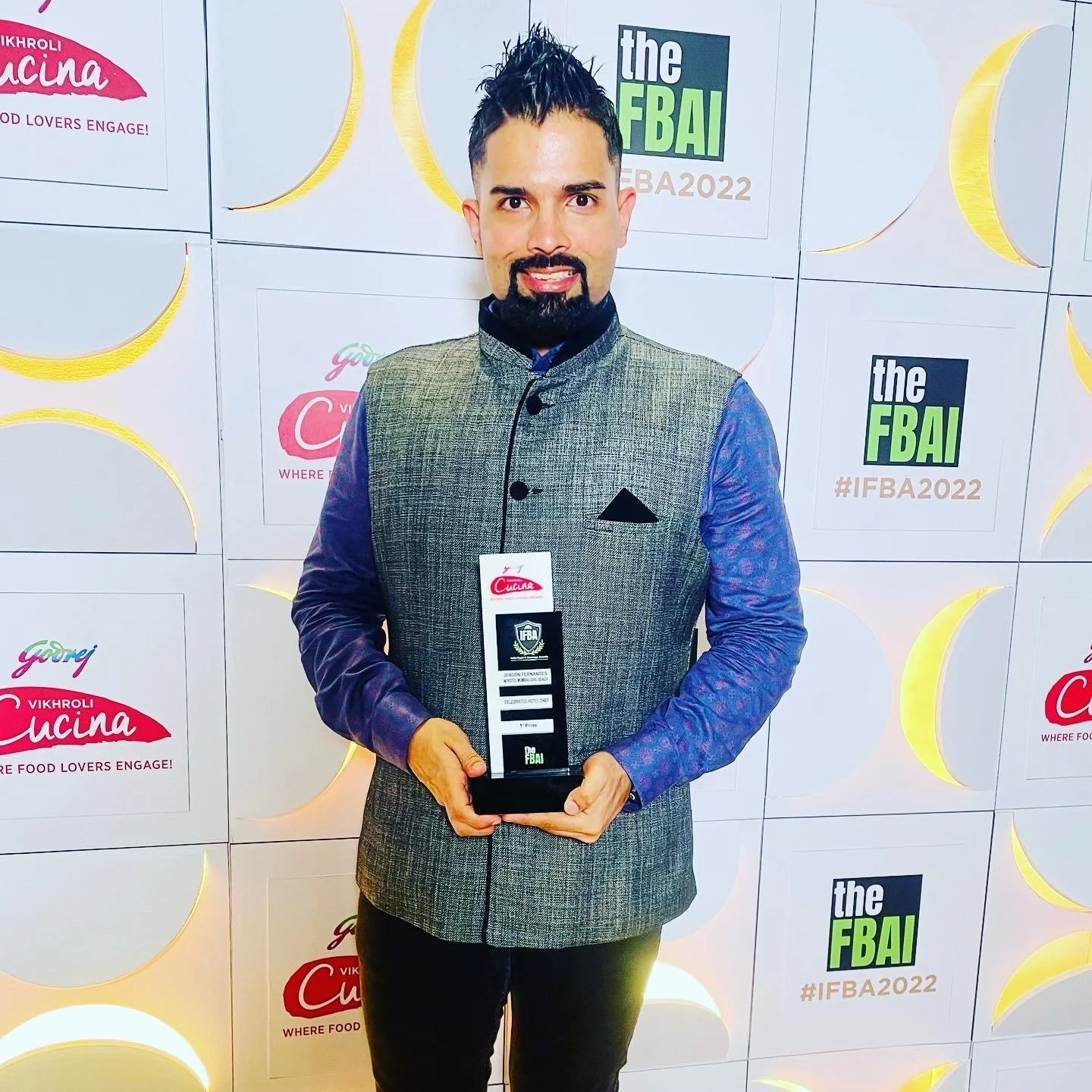 Chef Jerson with the award.JPG