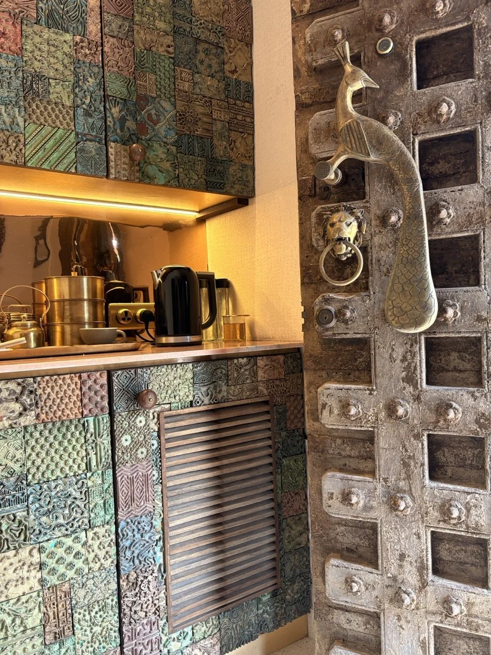  Vintage block-print blocks are repurposed to create a dramatic interior statement. 