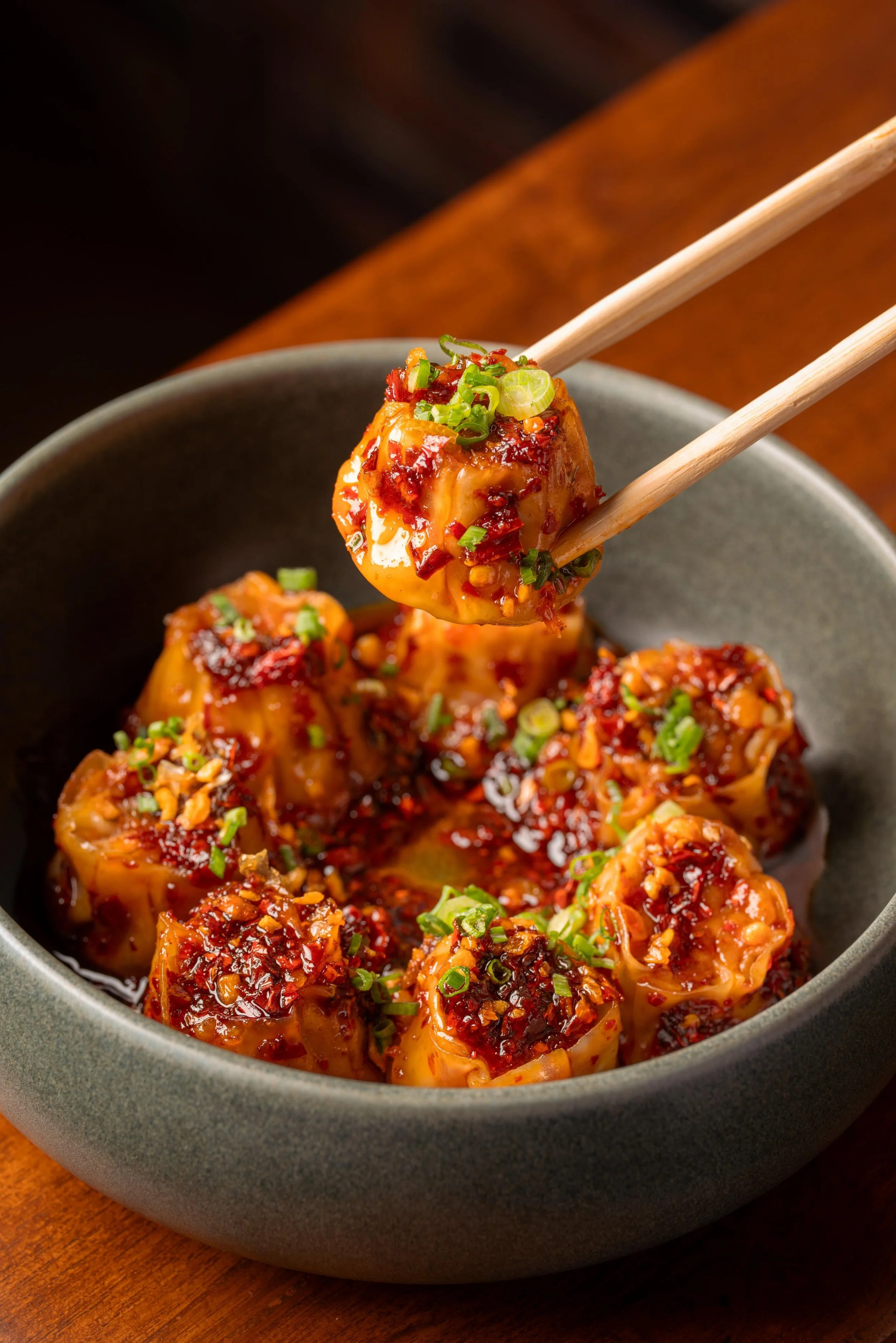 KHANOM JEEB DUMPLINGS, MINCED CHICKEN, CHILLI OIL.jpg