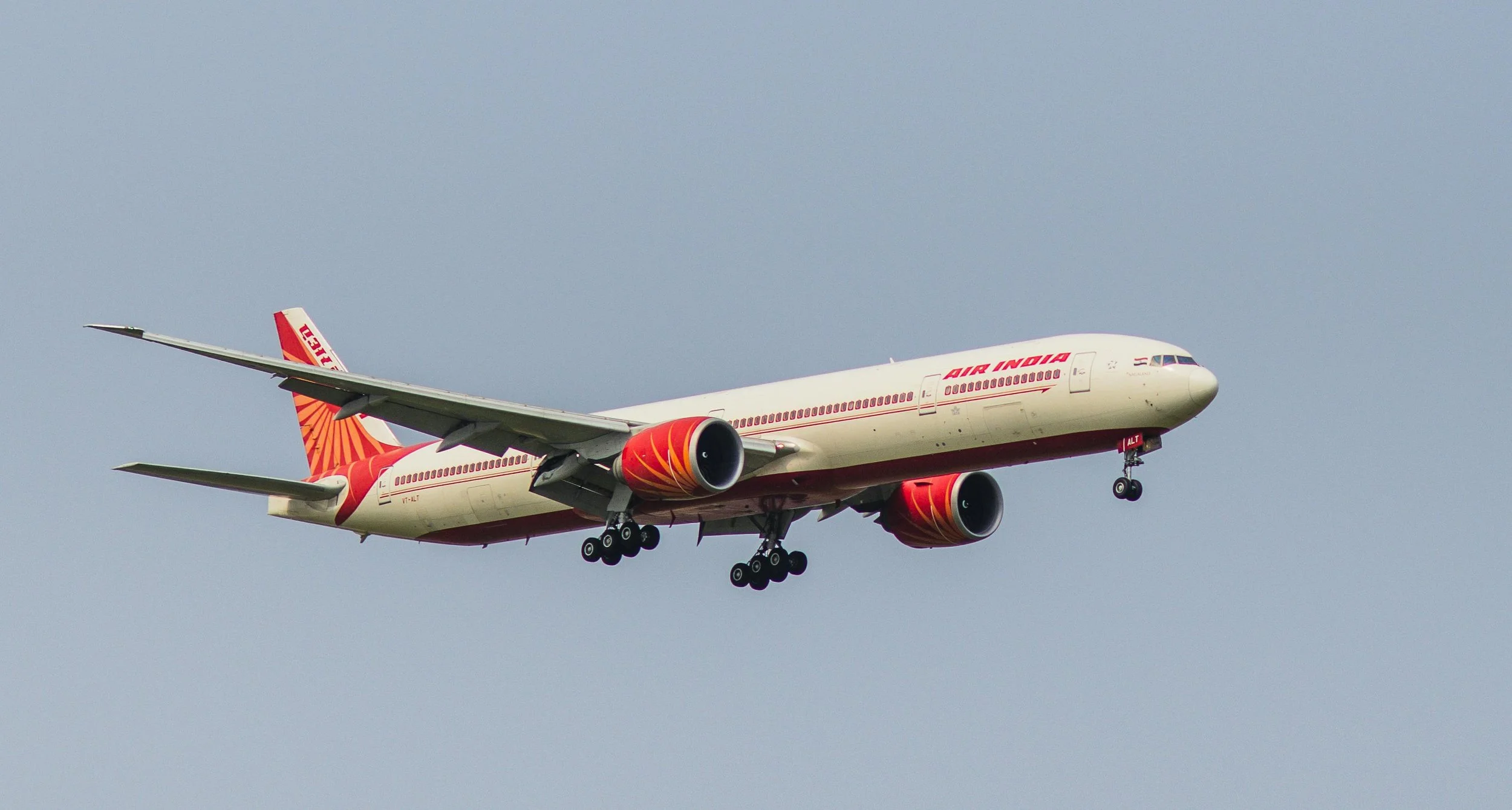free-photo-of-air-india-boeing-777-in-flight-with-clear-sky.jpeg