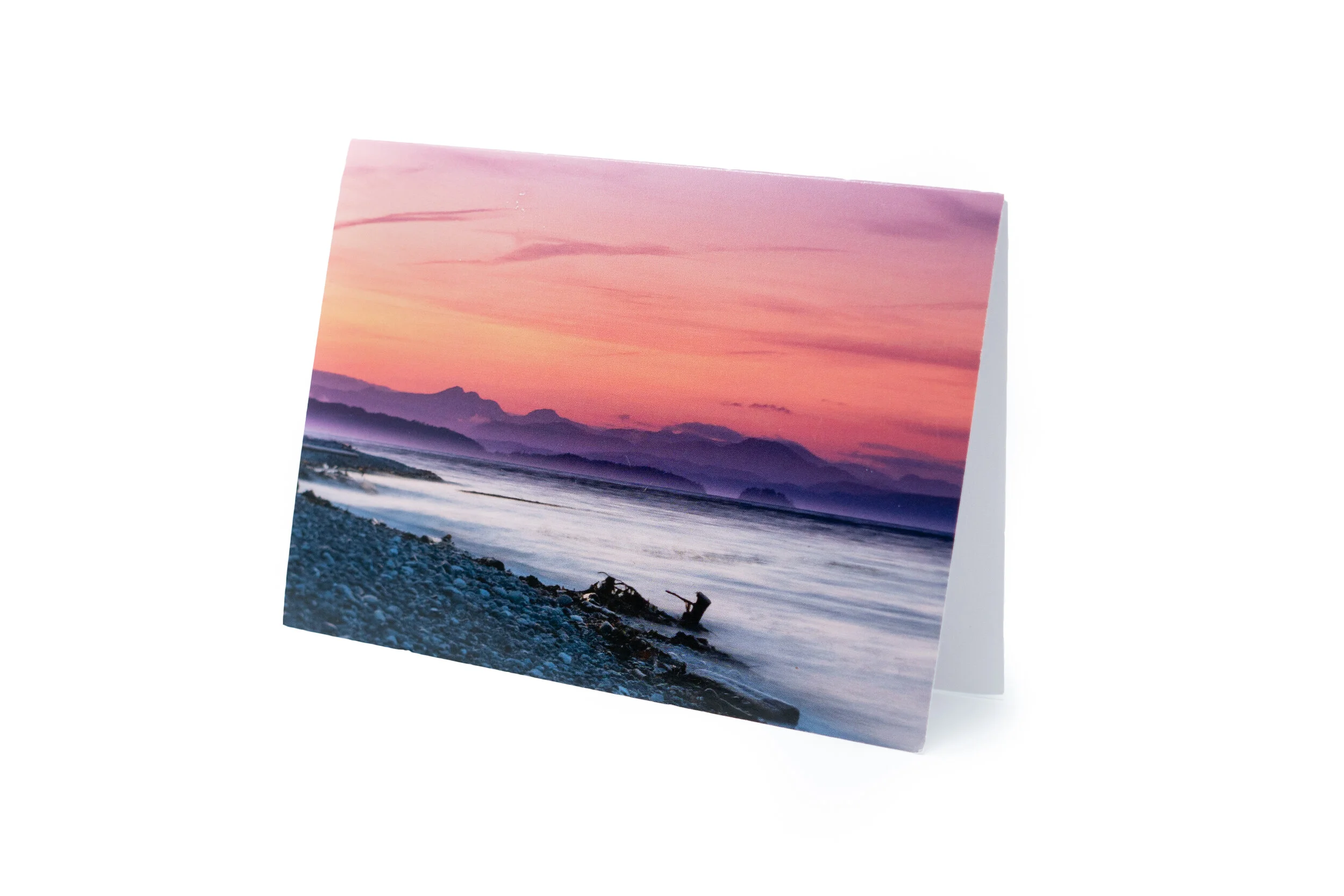 Sunset over the beach postcard
