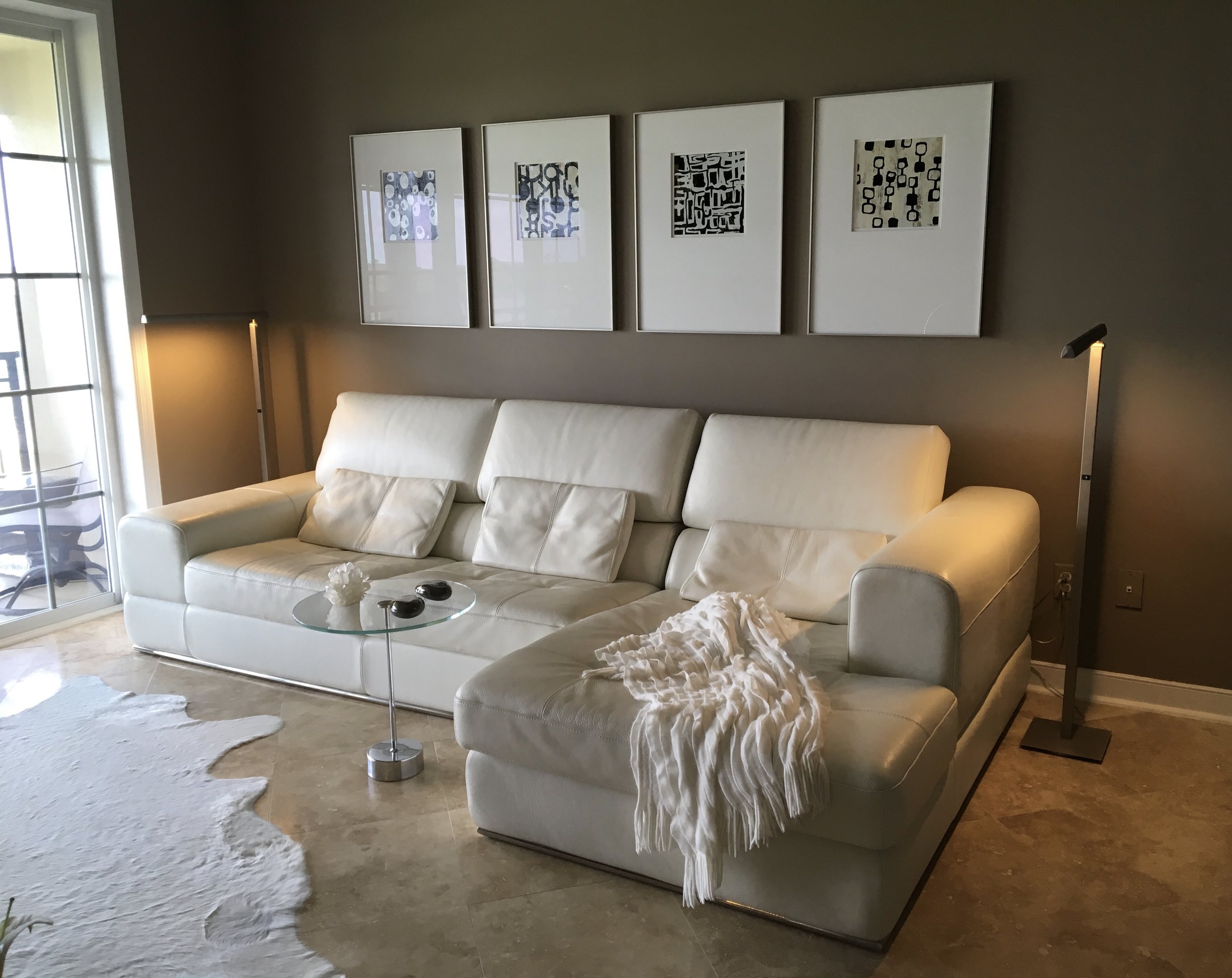 The living room area overlooks the marsh, a gathering place for evening sunsets.