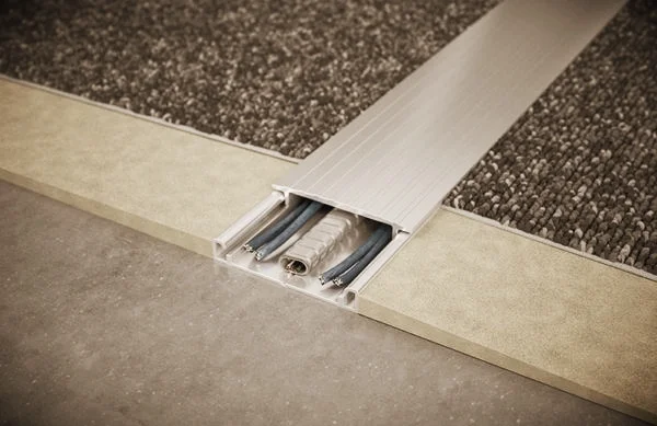 Davidson Violette is a Canadian dealer for Connectrac, an award winning ultra-low profile floor mounted wireway system that allows for power and data cabling to be delivered anywhere in a space without the need for core drilling, trenching or power poles.