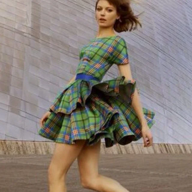 The Commonwealth Games medal bearer's dress commission, 2014 Promo Shoot Page1.jpeg